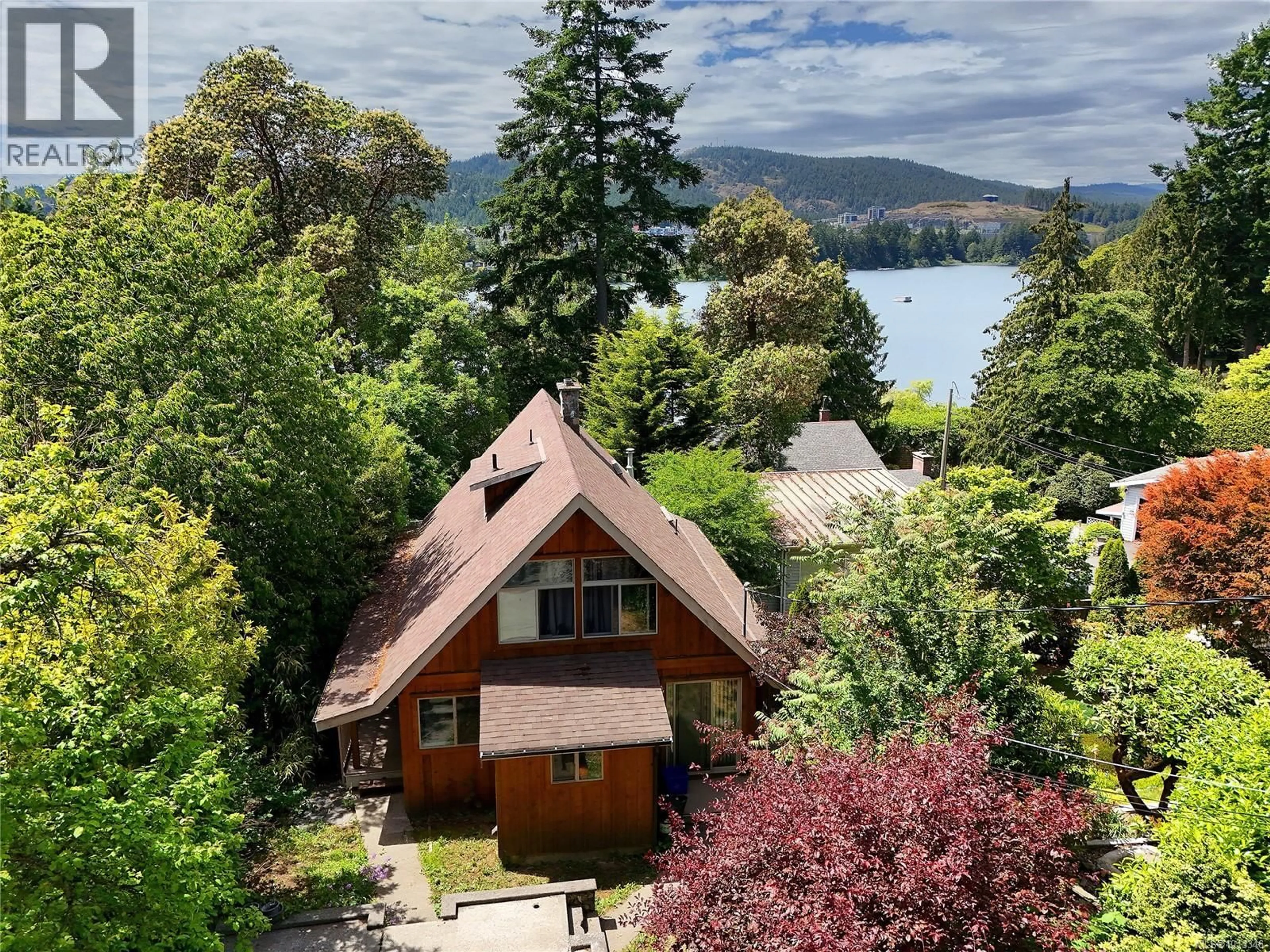 A pic from outside/outdoor area/front of a property/back of a property/a pic from drone, water/lake/river/ocean view for 2874 LEIGH ROAD, Langford British Columbia V9B4G3