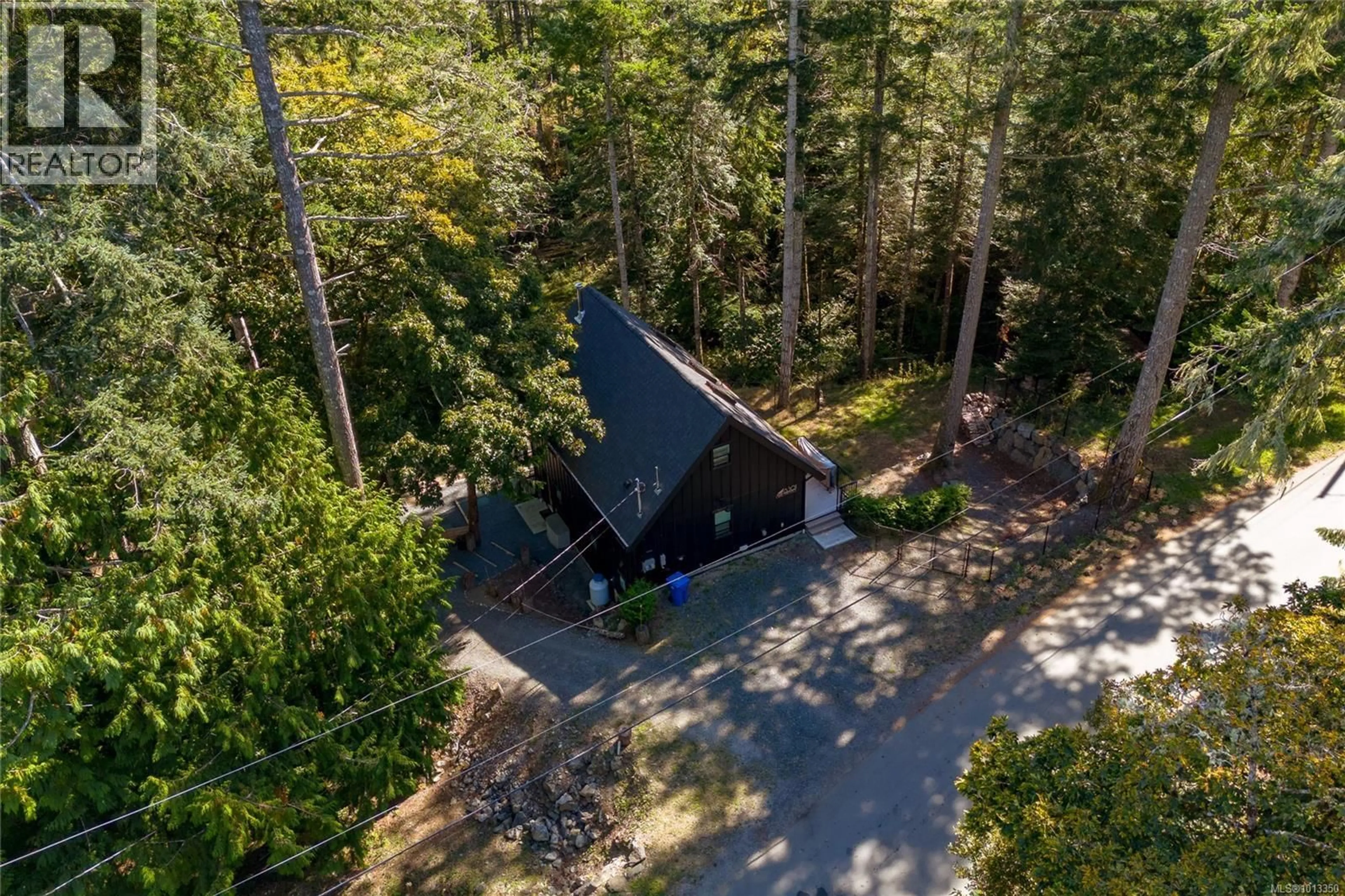 A pic from outside/outdoor area/front of a property/back of a property/a pic from drone, forest/trees view for 6301 QUAIL PEAK PLACE, Sooke British Columbia V9Z1A9