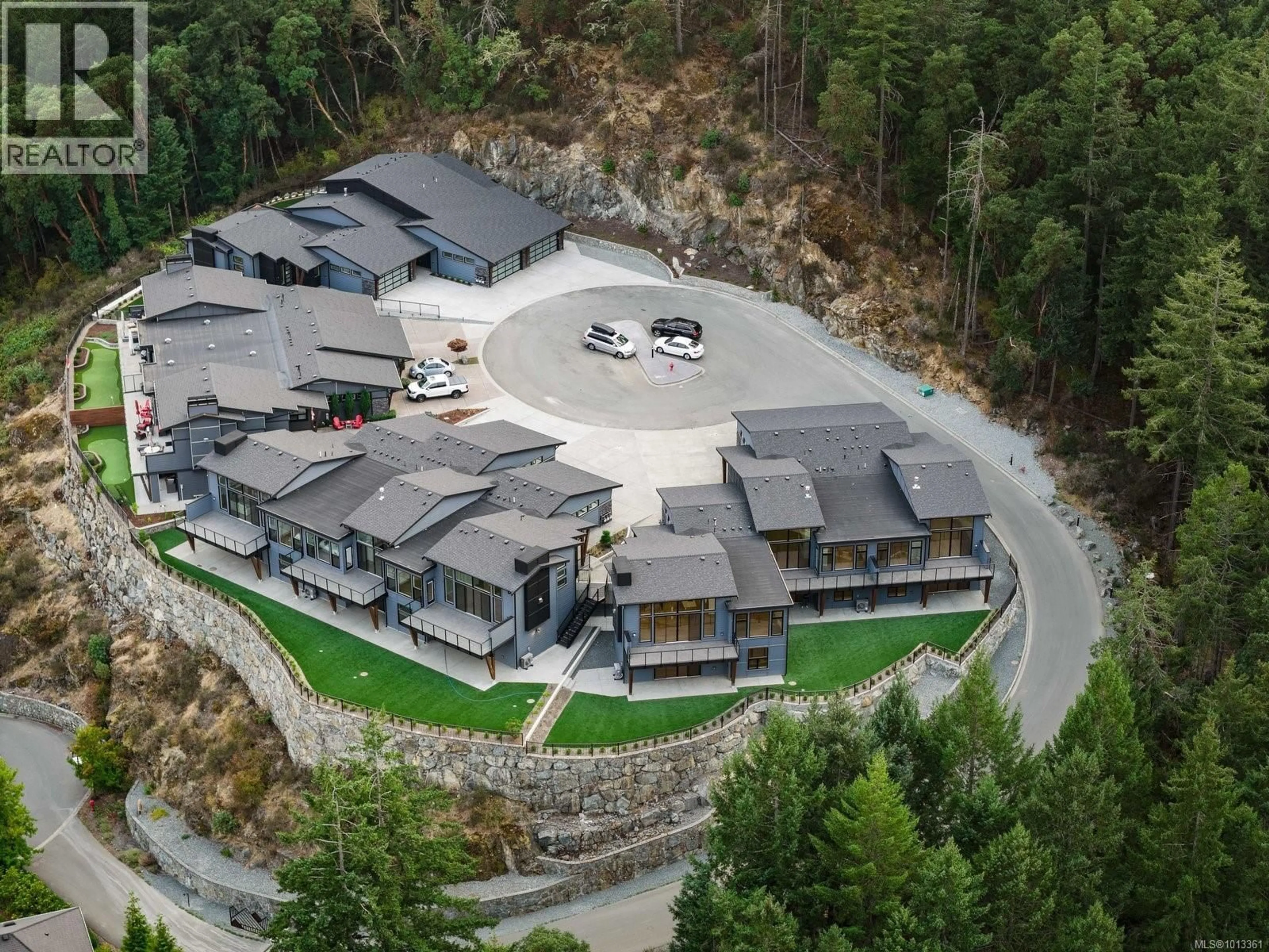A pic from outside/outdoor area/front of a property/back of a property/a pic from drone, mountain view for 105 - 2332 COPPER ROCK COURT, Langford British Columbia V9B0G4