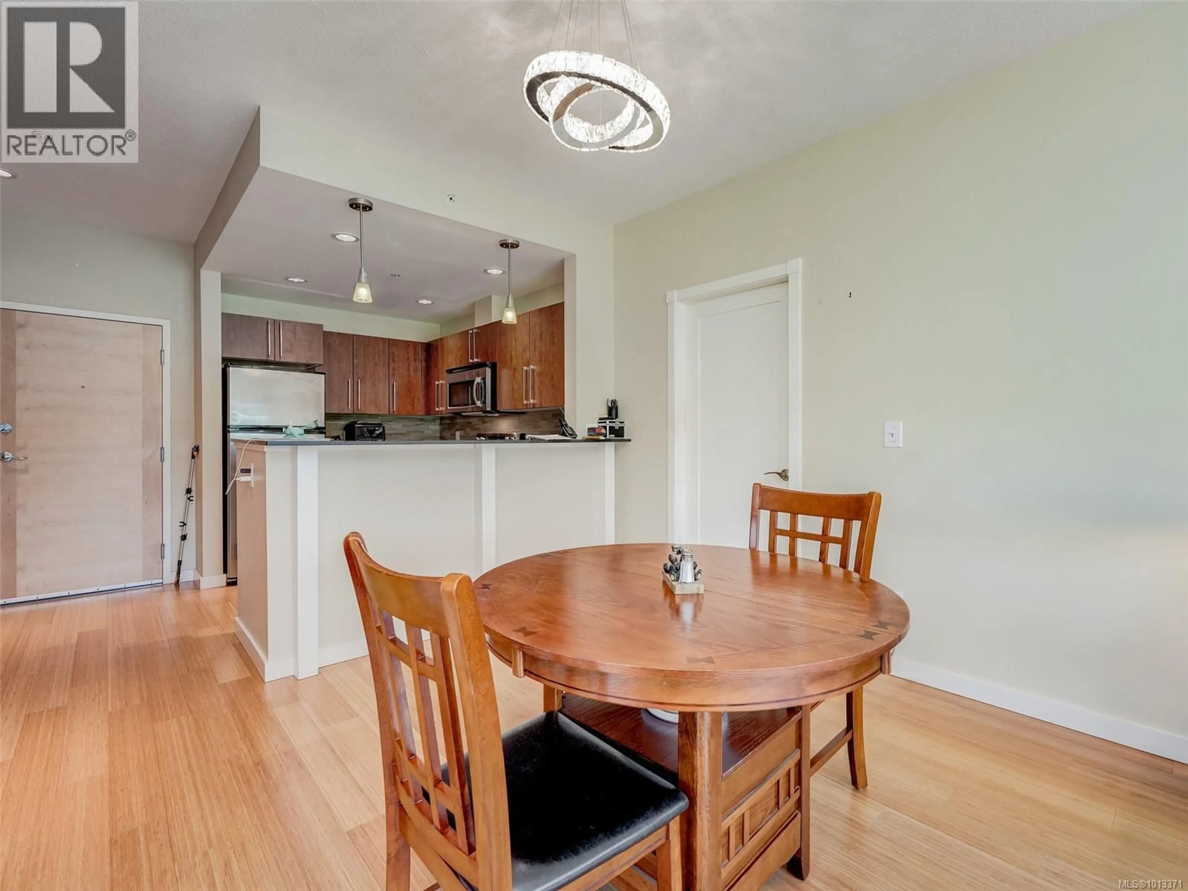 Open concept kitchen, wood/laminate floor for 301 - 611 BROOKSIDE ROAD, Colwood British Columbia V9C0C3