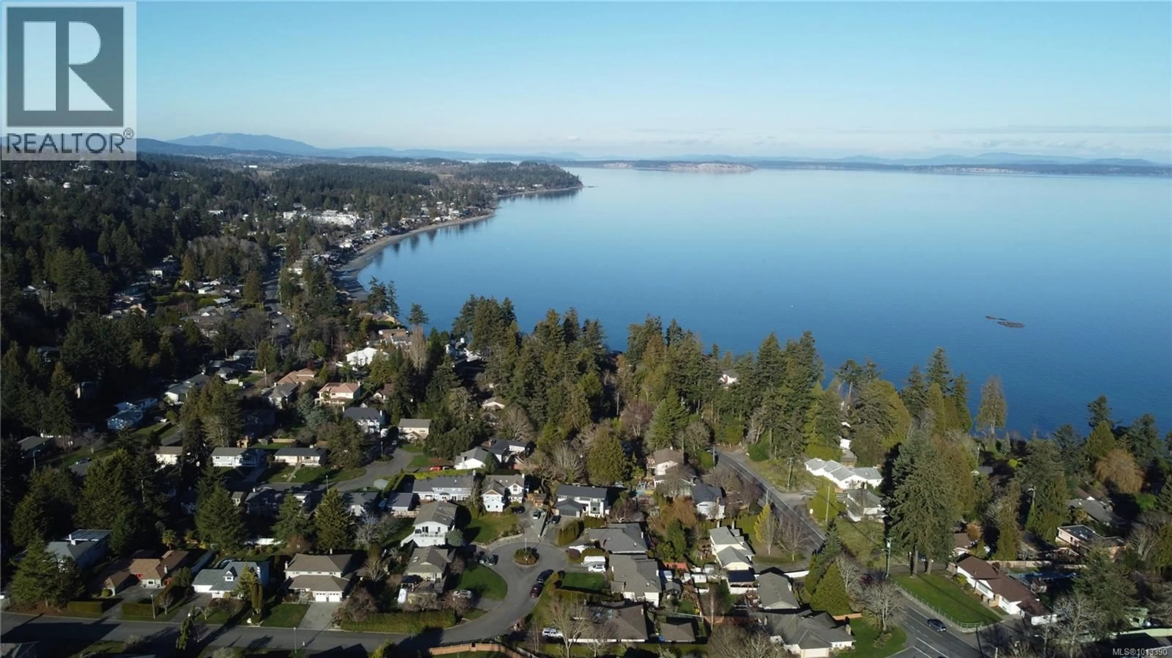 A pic from outside/outdoor area/front of a property/back of a property/a pic from drone, water/lake/river/ocean view for 986 SEAPEARL PLACE, Saanich British Columbia V8Y2X3