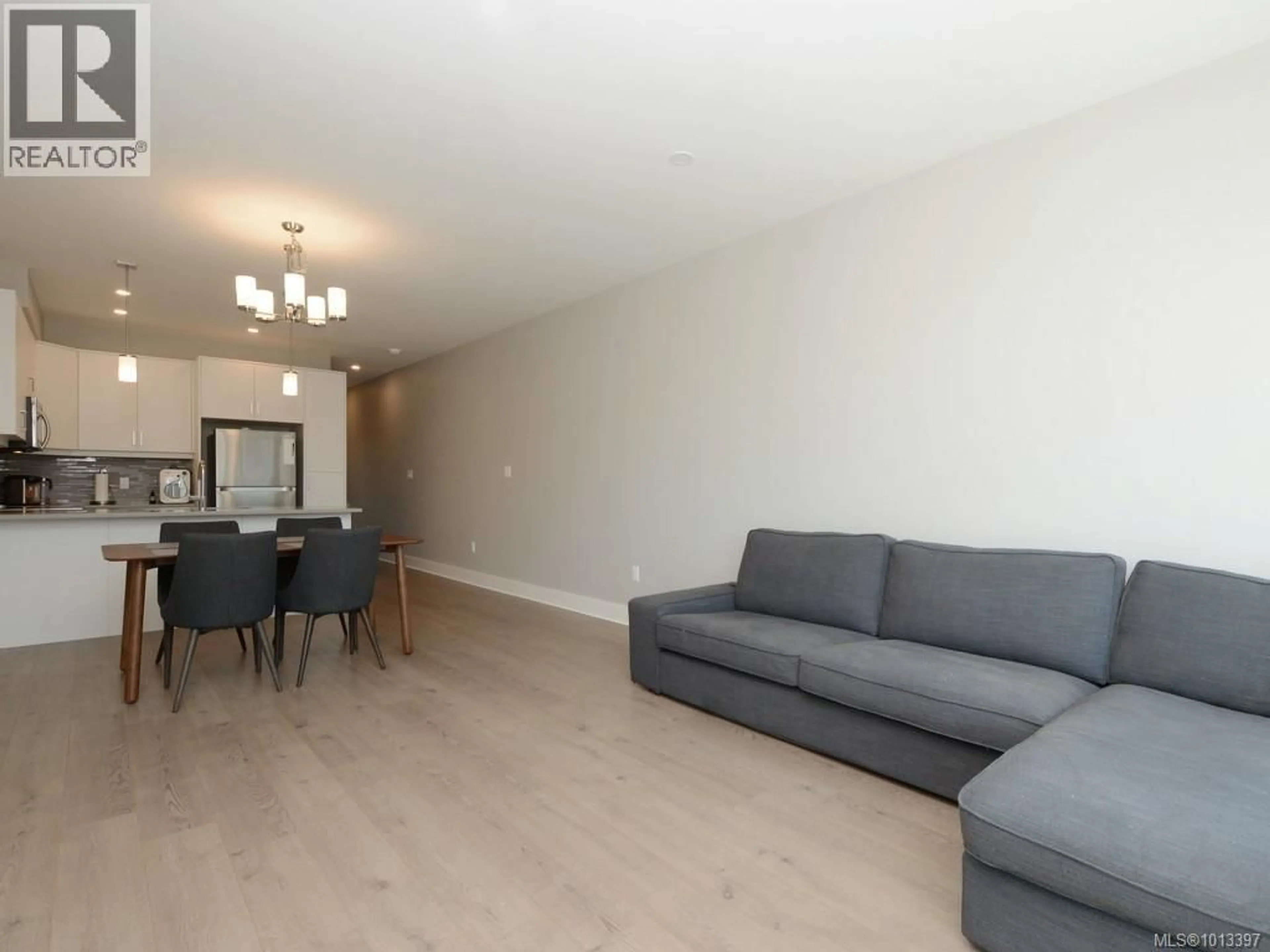 Living room with furniture, wood/laminate floor for 948 WARBLER CLOSE, Langford British Columbia V9C0J4