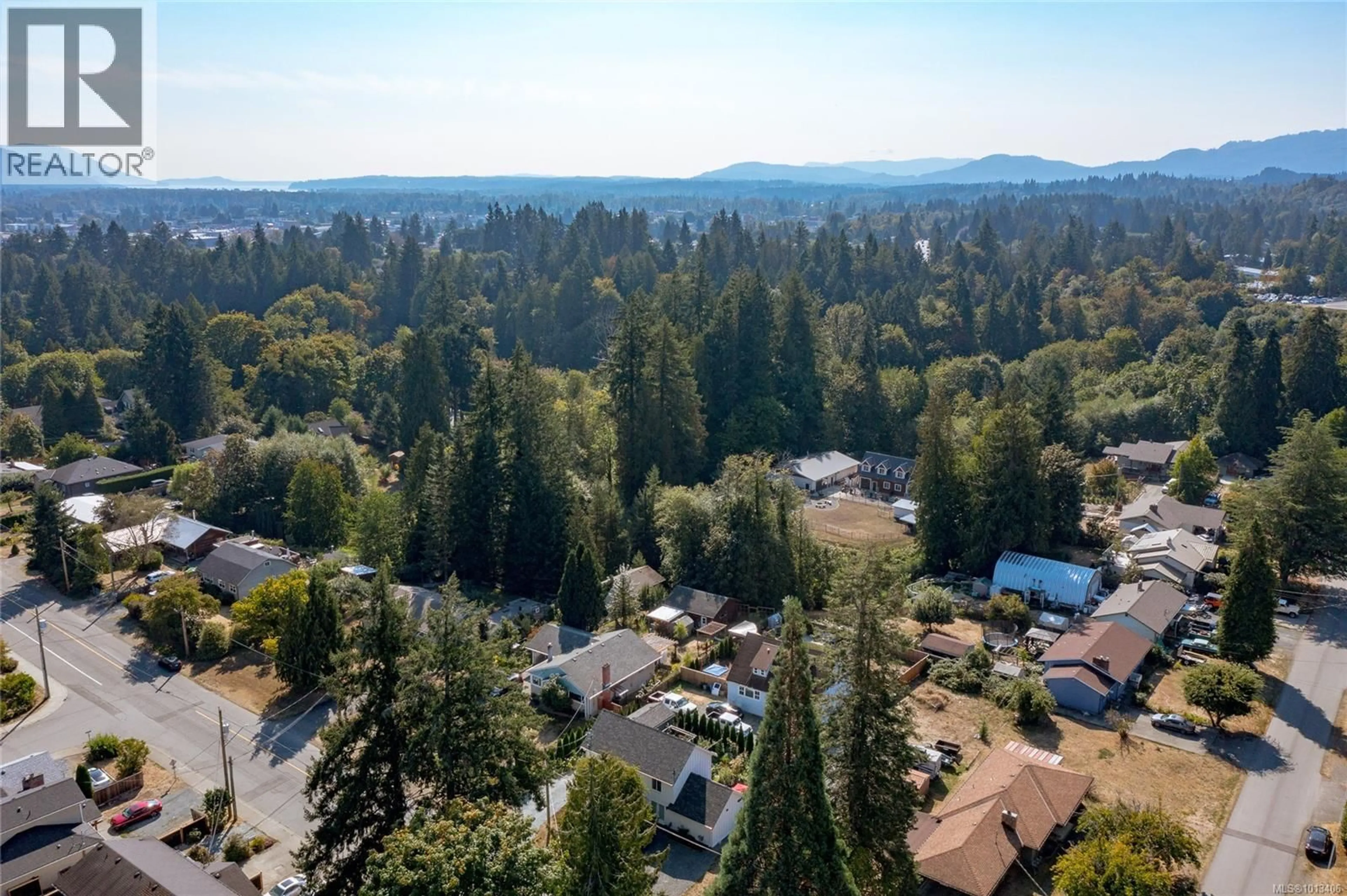 A pic from outside/outdoor area/front of a property/back of a property/a pic from drone, forest/trees view for 3012 GEORGE STREET, Duncan British Columbia V9L2A9