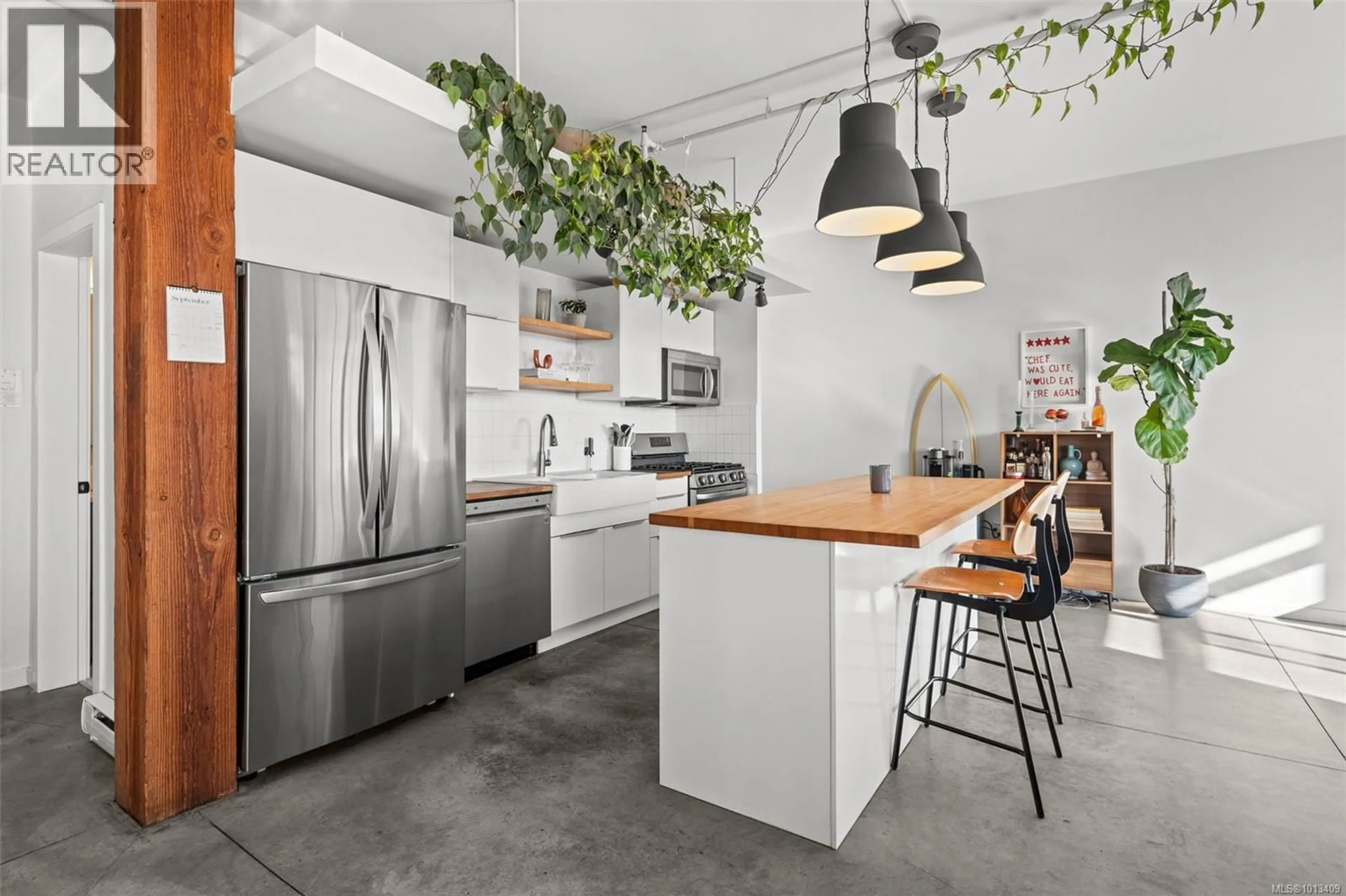 Open concept kitchen, cement floor for 311 - 455 SITKUM ROAD, Victoria British Columbia V9A7N9