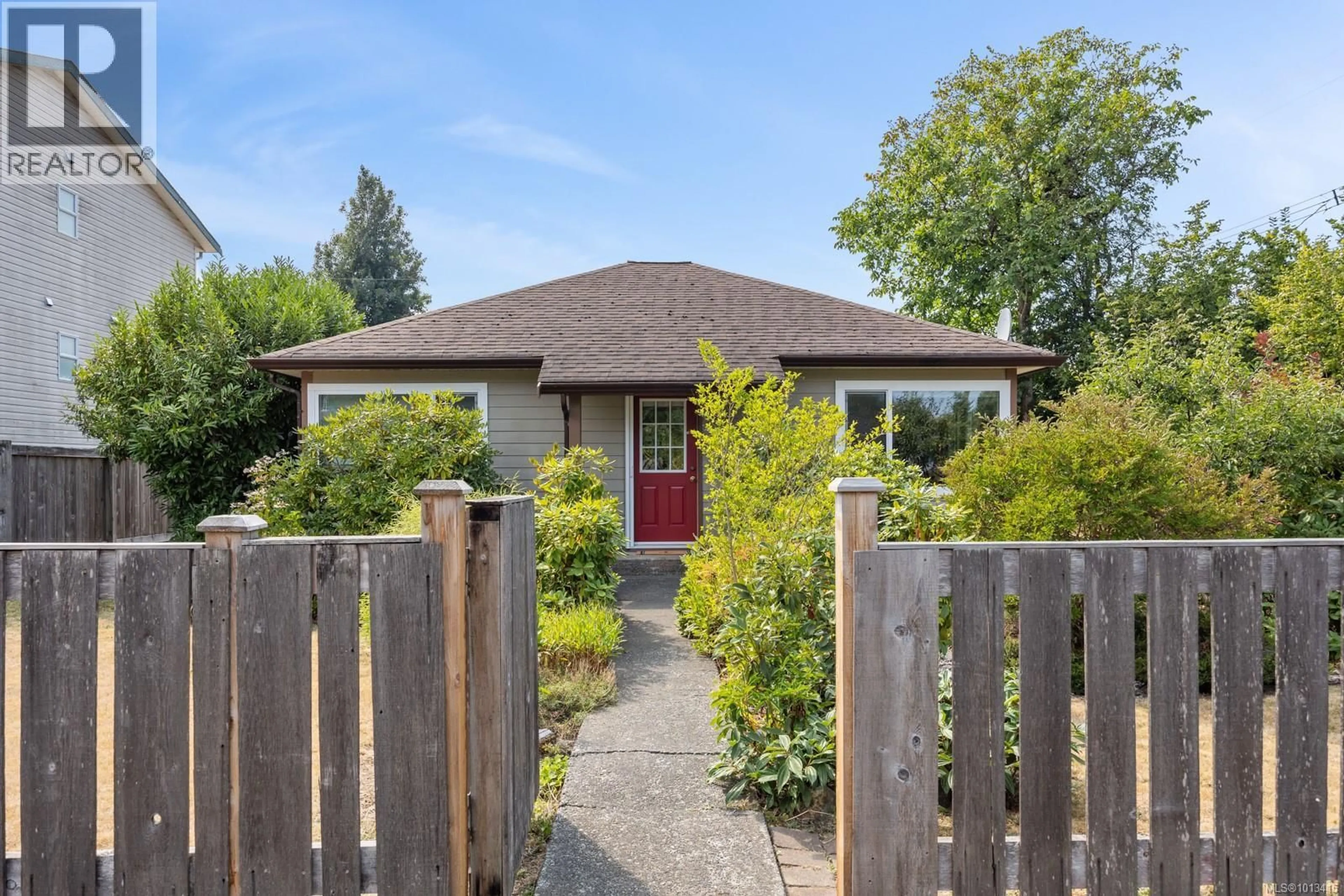 Home with brick exterior material, street for 1009 URQUHART AVENUE, Courtenay British Columbia V9N3K6
