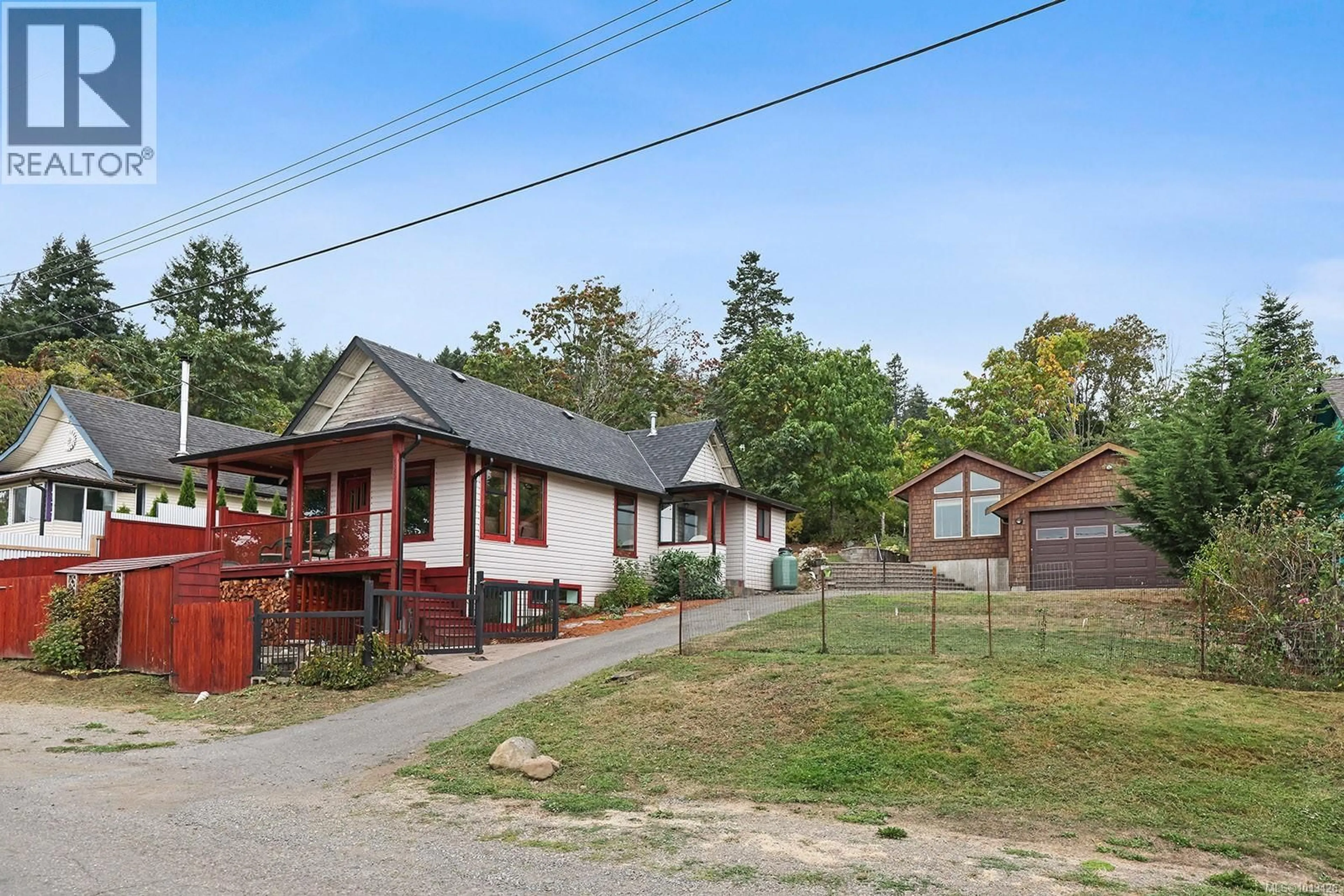 A pic from outside/outdoor area/front of a property/back of a property/a pic from drone, street for 5629 1ST STREET, Union Bay British Columbia V0R3B0
