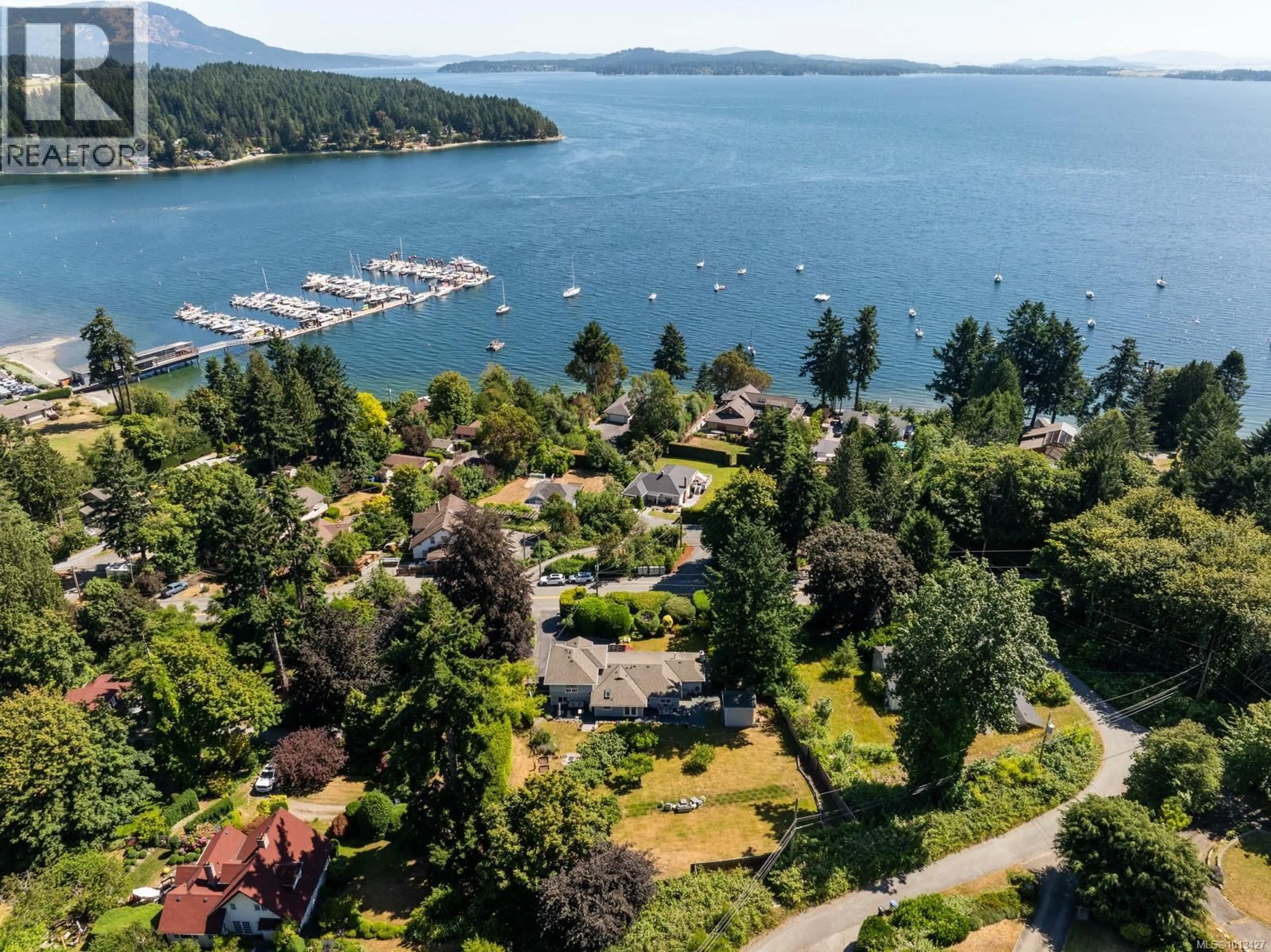 A pic from outside/outdoor area/front of a property/back of a property/a pic from drone, water/lake/river/ocean view for 2618 MILL BAY ROAD, Mill Bay British Columbia V8H1C9