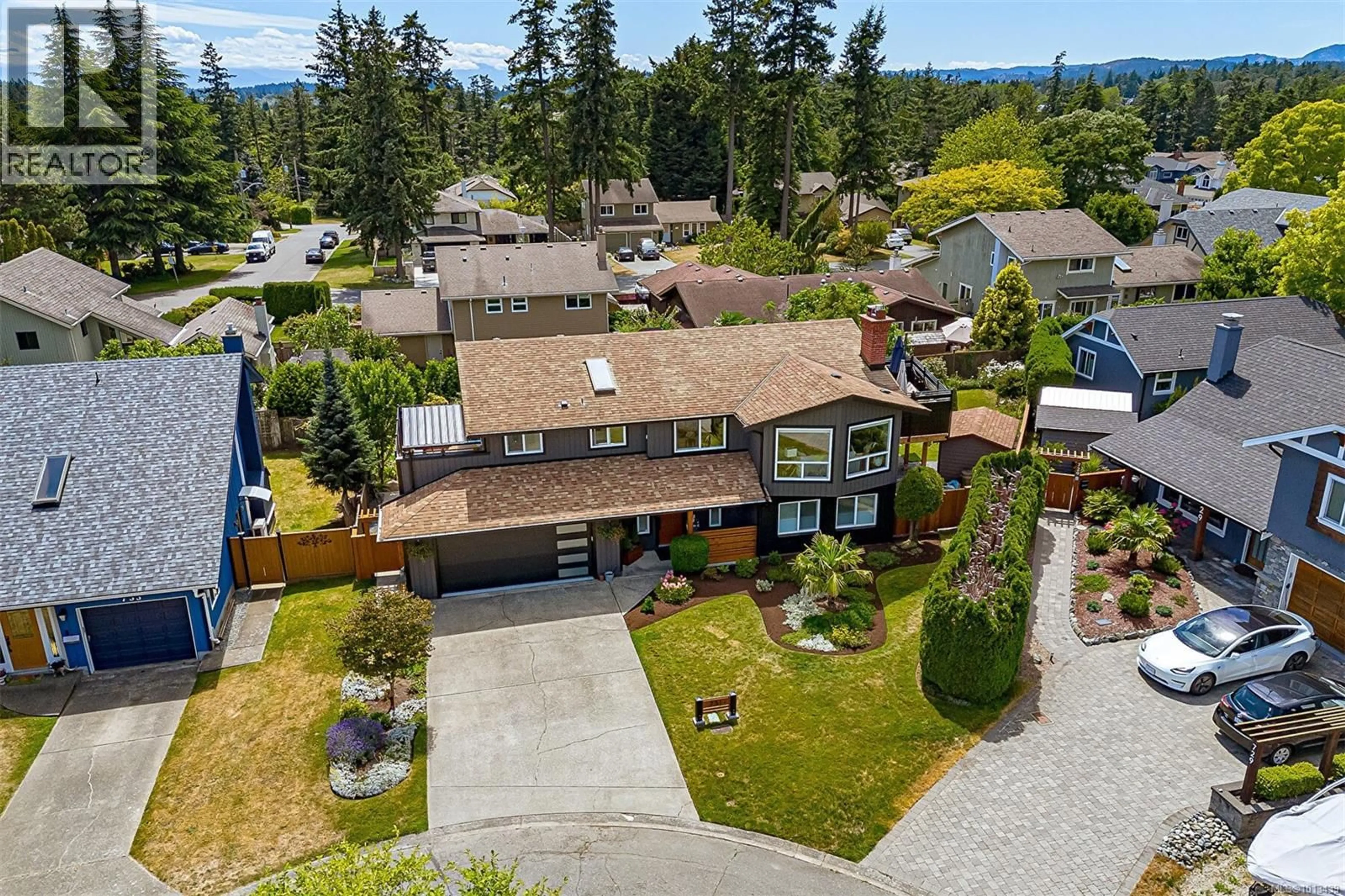 A pic from outside/outdoor area/front of a property/back of a property/a pic from drone, street for 731 PASKIN WAY, Saanich British Columbia V8Z6N4