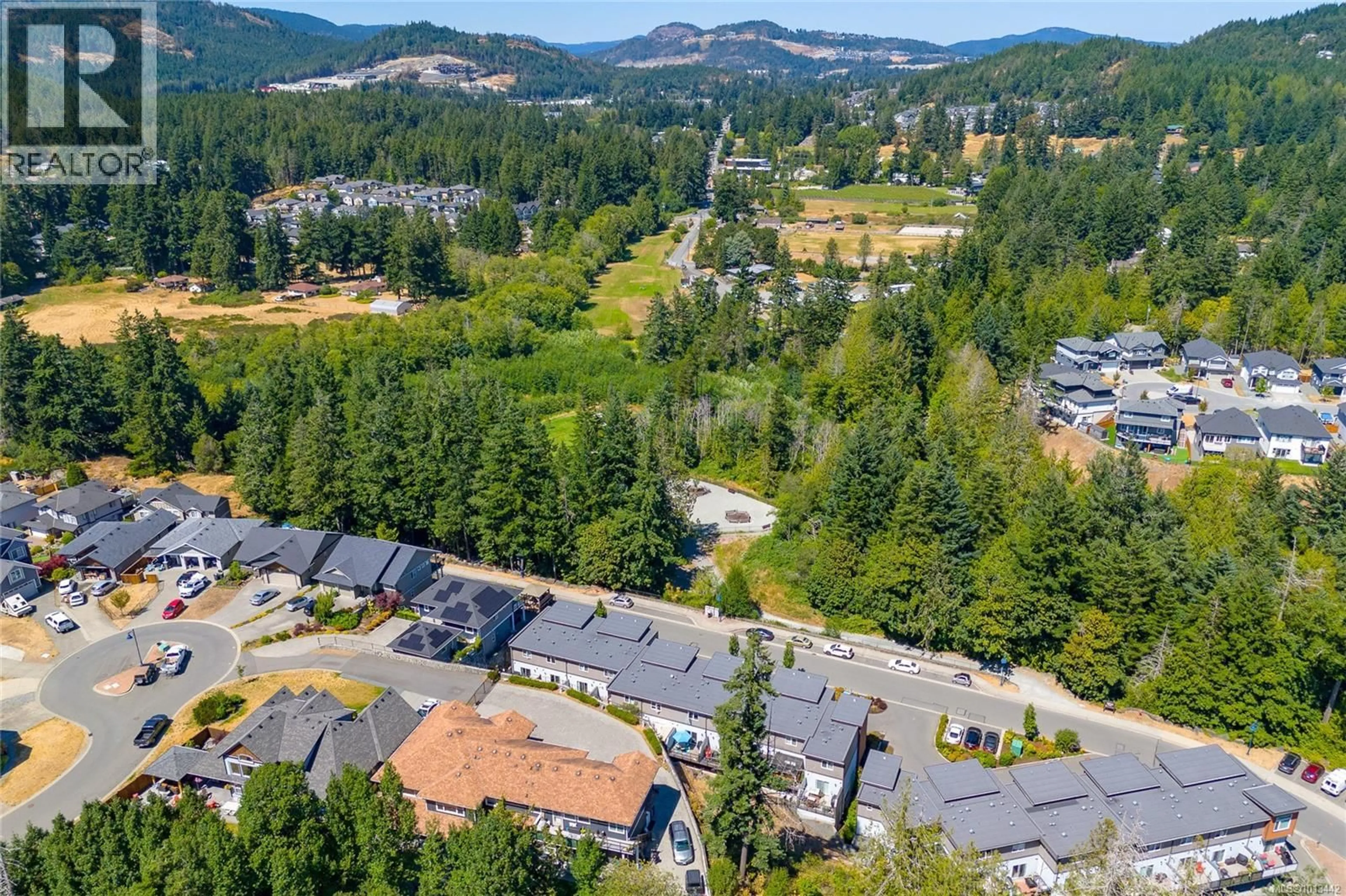 A pic from outside/outdoor area/front of a property/back of a property/a pic from drone, mountain view for 127 - 933 WILD RIDGE WAY, Langford British Columbia V9C0H1