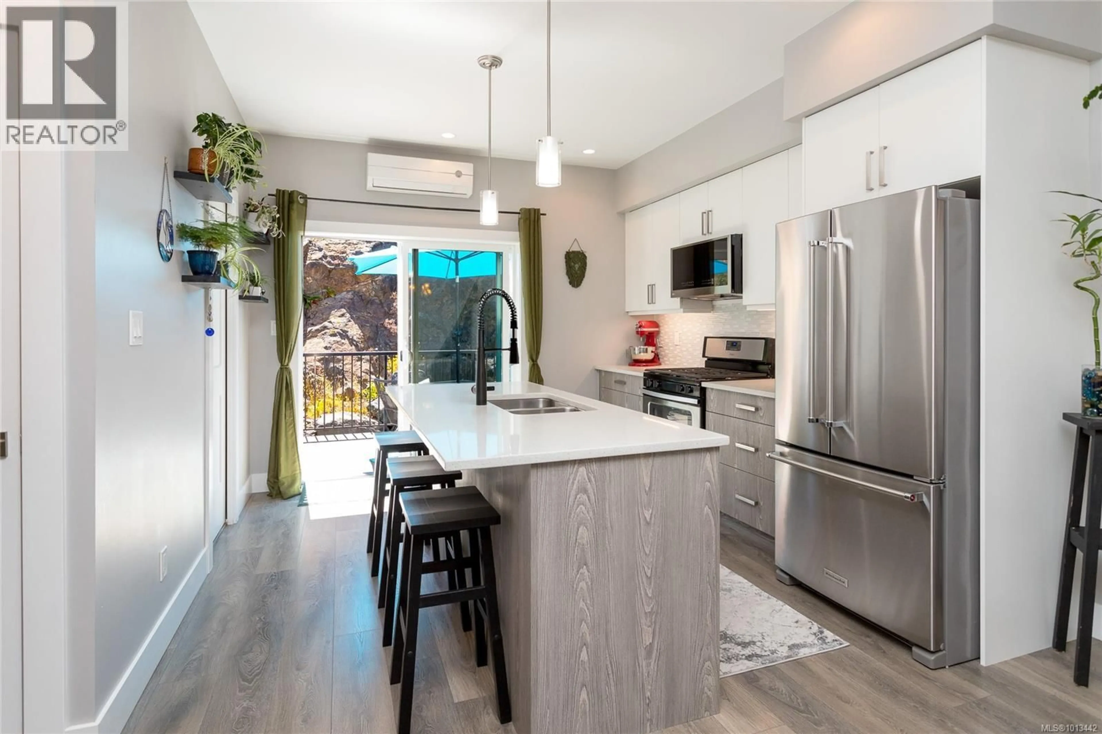 Open concept kitchen, ceramic/tile floor for 127 - 933 WILD RIDGE WAY, Langford British Columbia V9C0H1