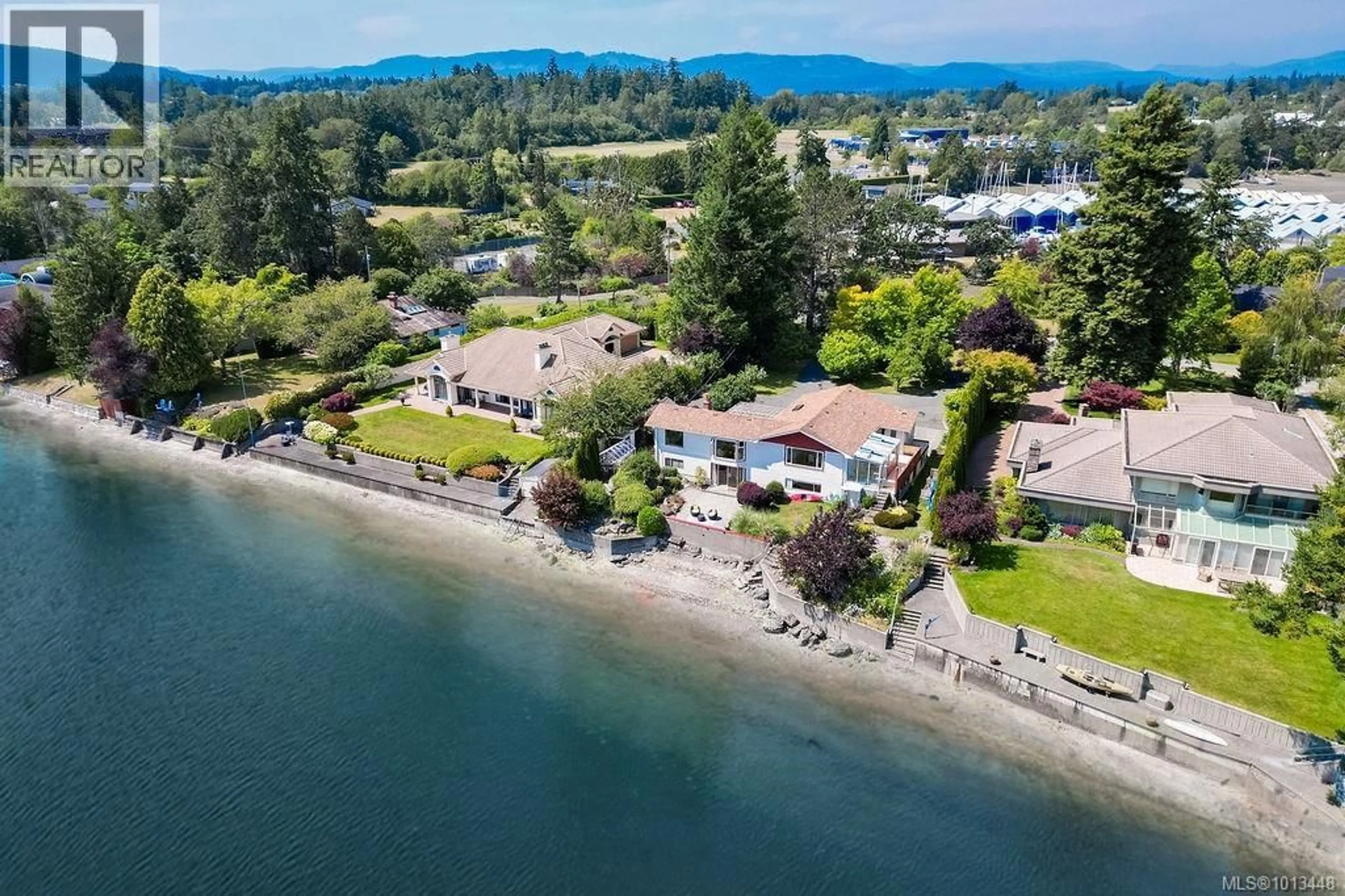 A pic from outside/outdoor area/front of a property/back of a property/a pic from drone, water/lake/river/ocean view for 10655 BLUE HERON ROAD, North Saanich British Columbia V8L5S6