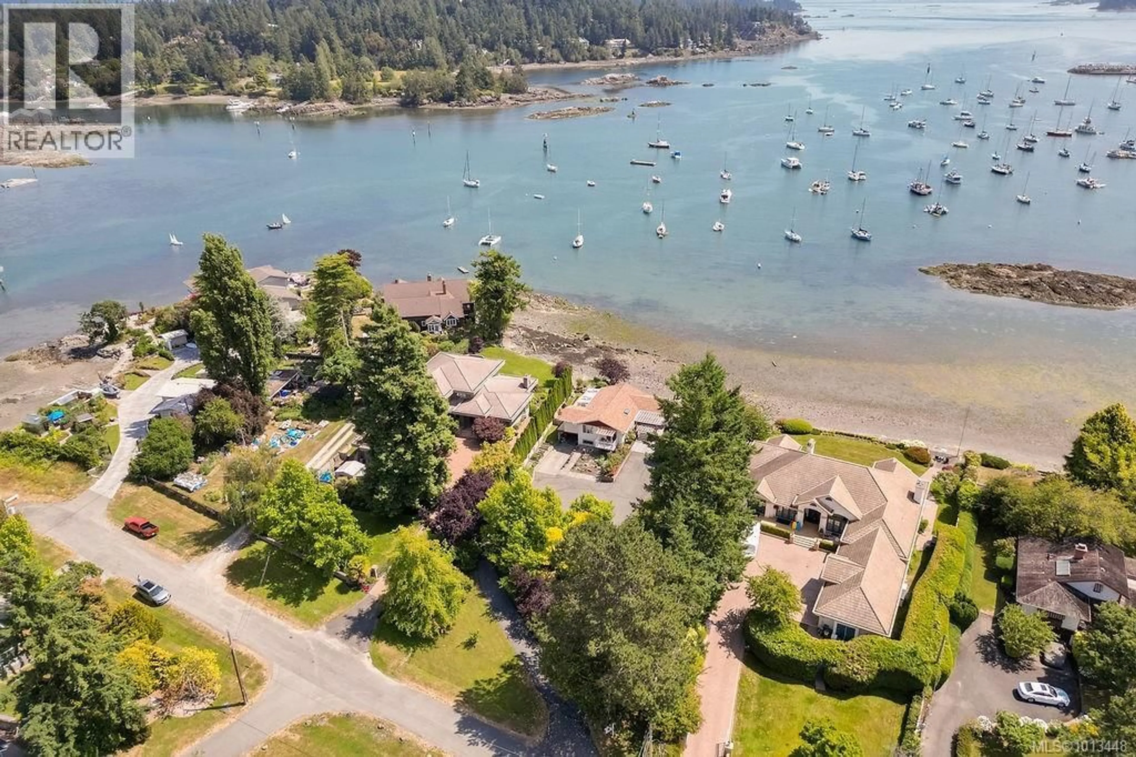 A pic from outside/outdoor area/front of a property/back of a property/a pic from drone, water/lake/river/ocean view for 10655 BLUE HERON ROAD, North Saanich British Columbia V8L5S6