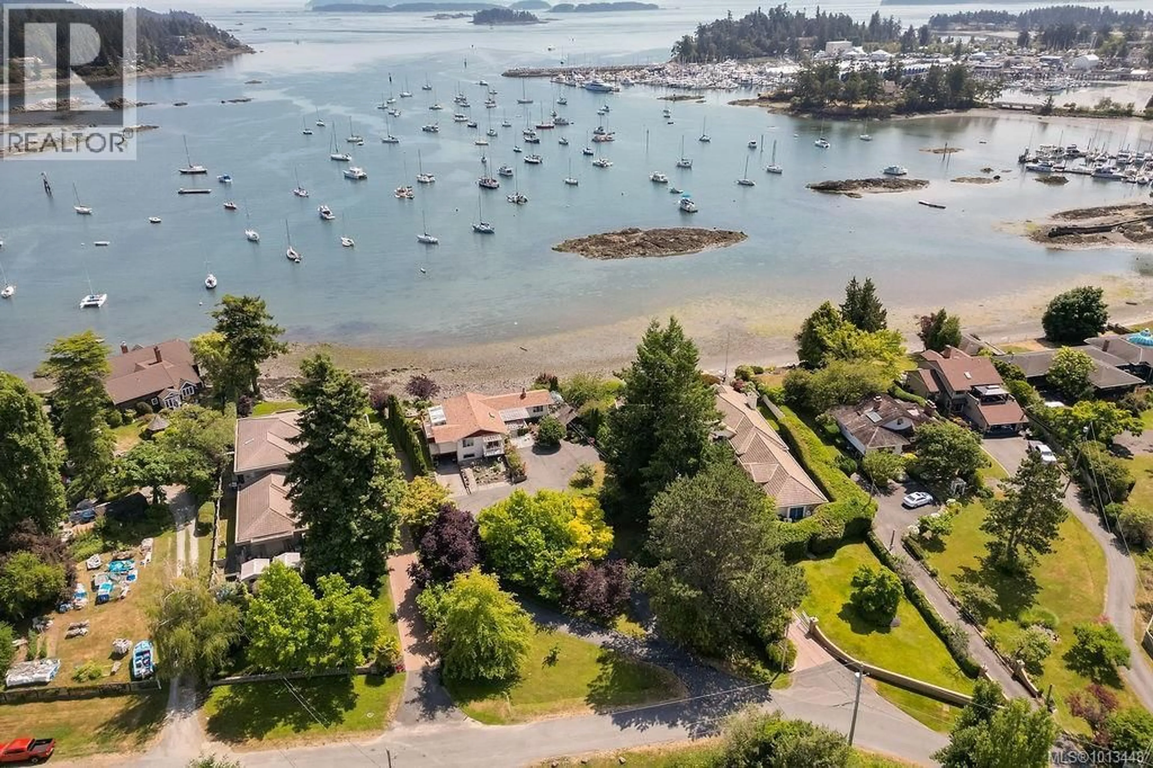 A pic from outside/outdoor area/front of a property/back of a property/a pic from drone, water/lake/river/ocean view for 10655 BLUE HERON ROAD, North Saanich British Columbia V8L5S6