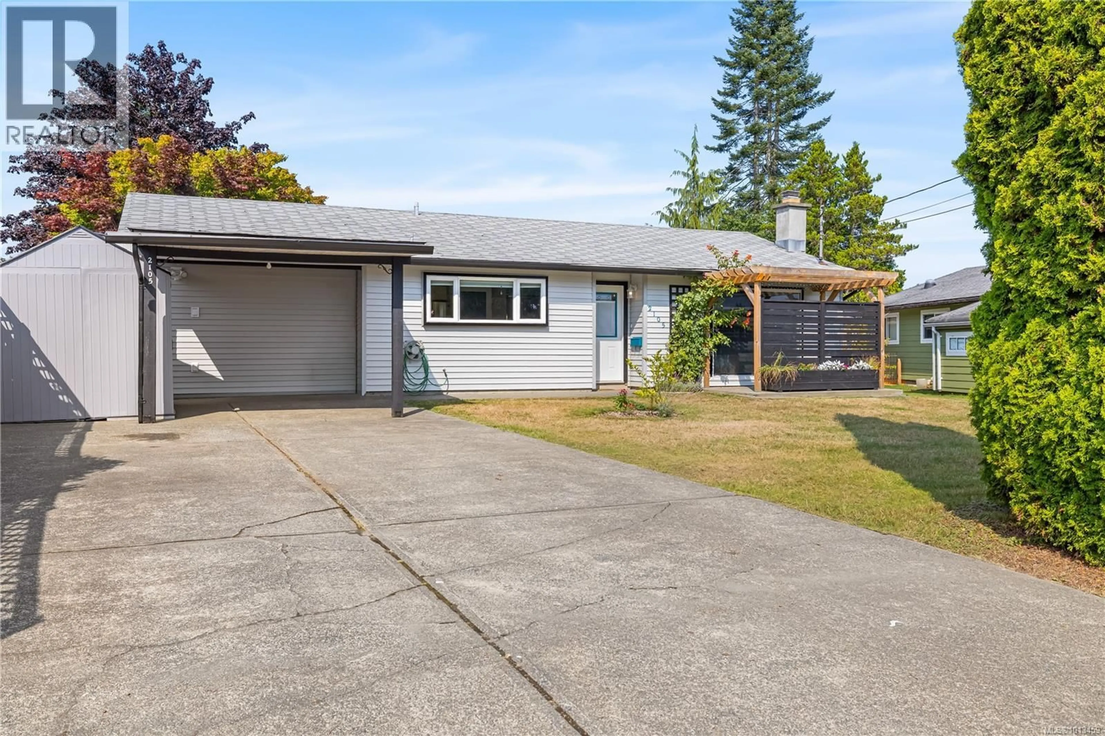 A pic from outside/outdoor area/front of a property/back of a property/a pic from drone, street for 2105 ARNASON ROAD, Campbell River British Columbia V9W5Z4
