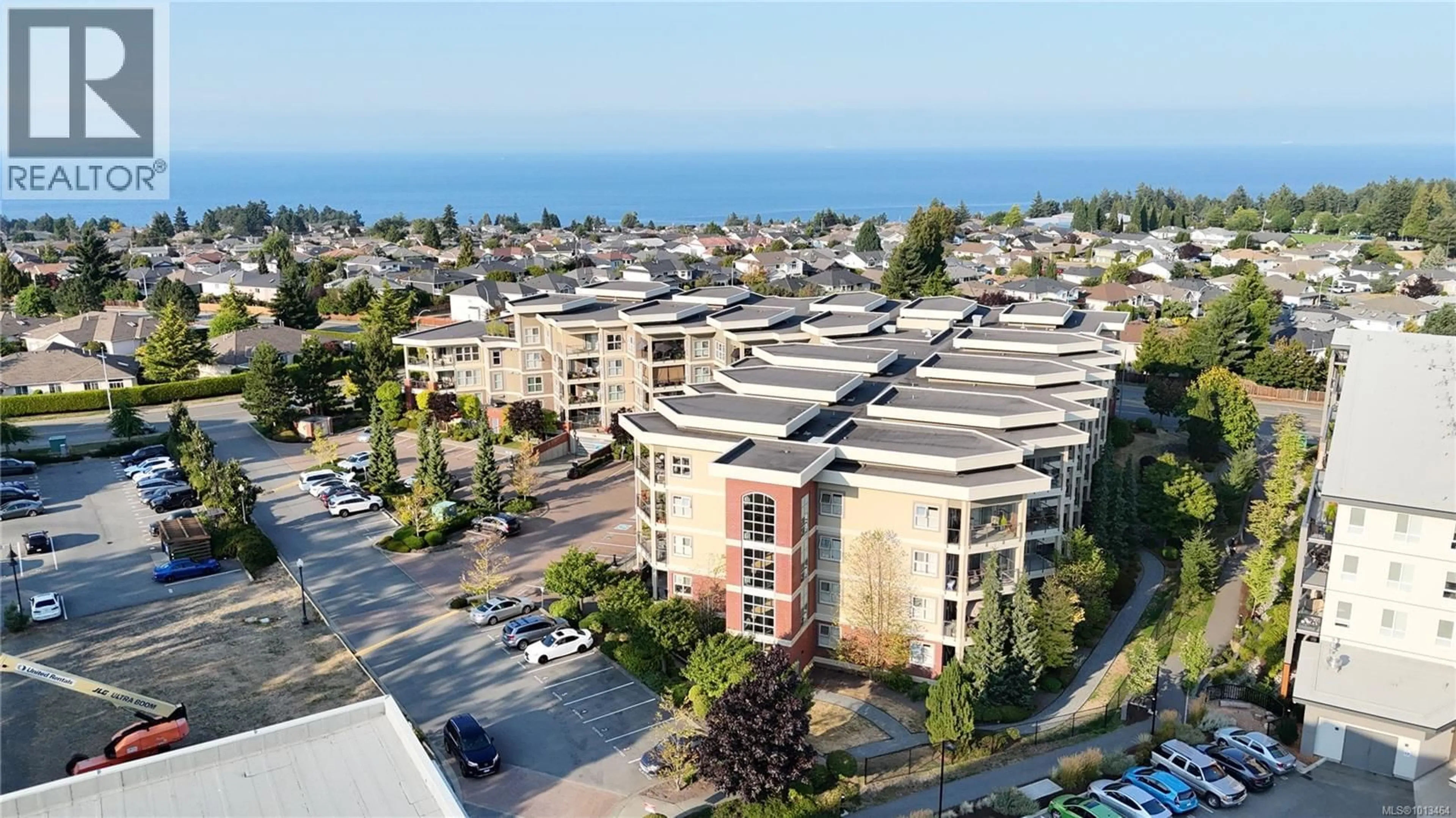 A pic from outside/outdoor area/front of a property/back of a property/a pic from drone, unknown for 321 - 6310 MCROBB AVENUE, Nanaimo British Columbia V9V1W8
