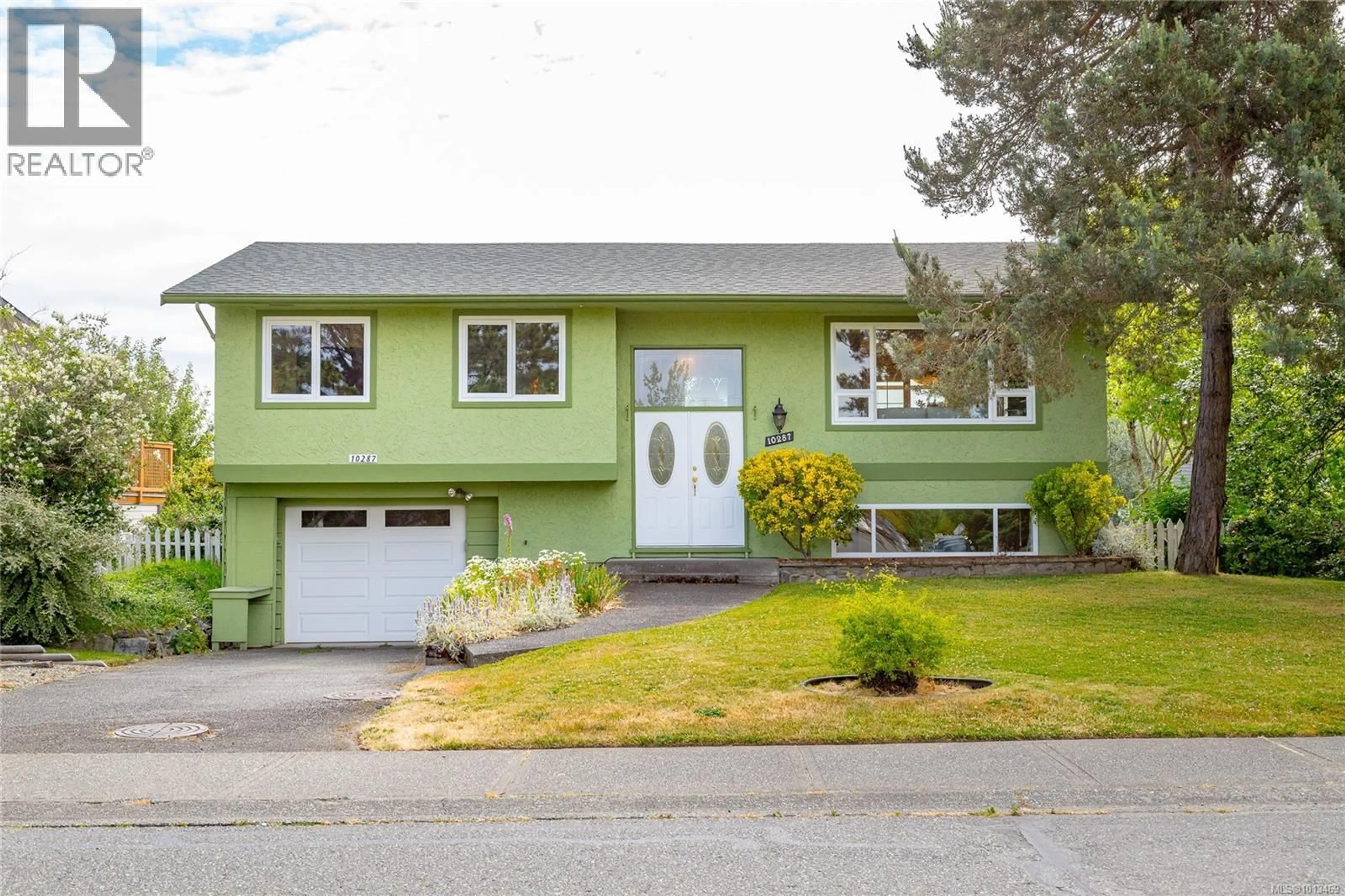 Home with vinyl exterior material, street for 10287 BOWERBANK ROAD, Sidney British Columbia V8L3L2