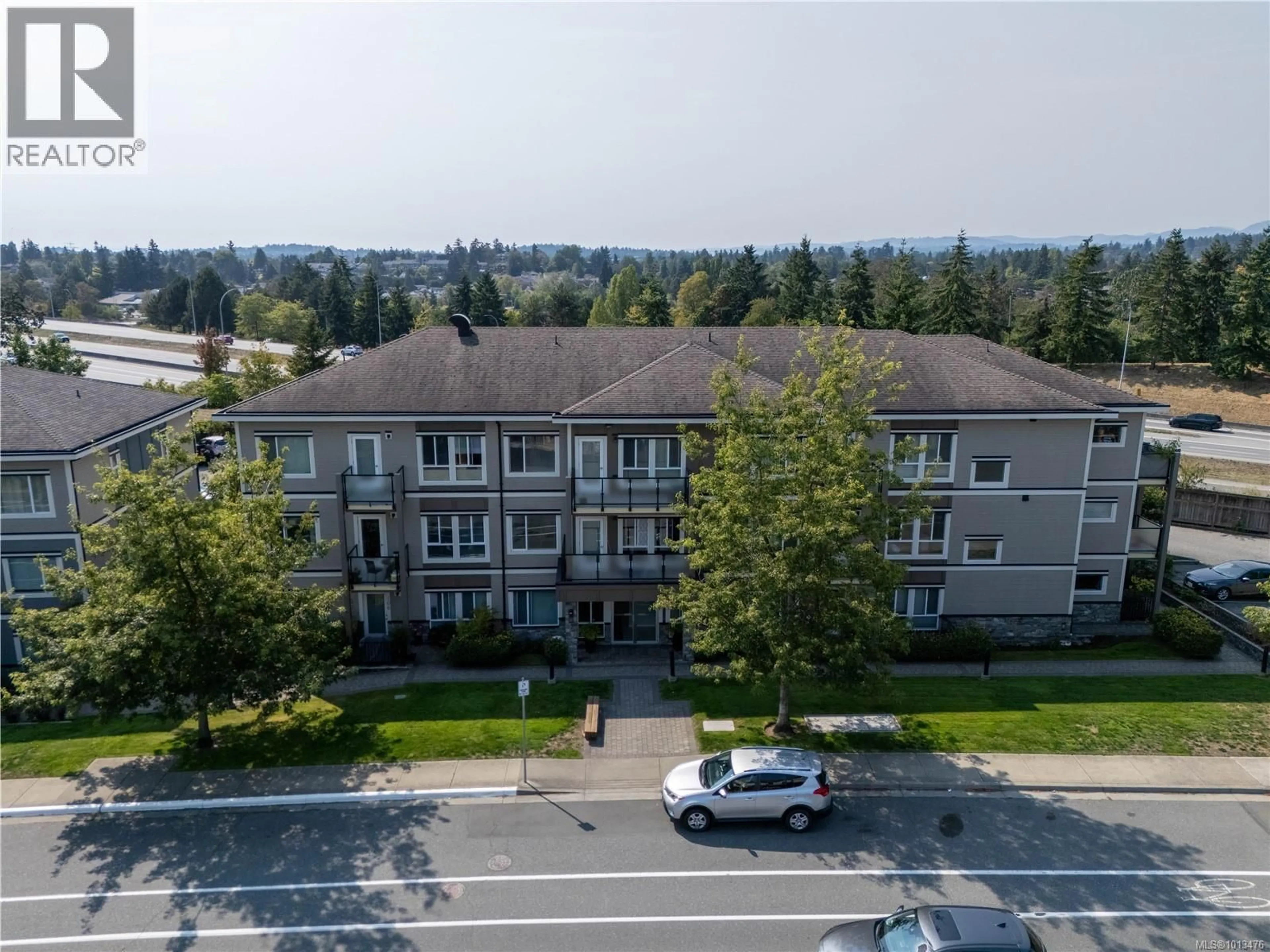 A pic from outside/outdoor area/front of a property/back of a property/a pic from drone, mountain view for 207 - 4052 DOUGLAS STREET, Saanich British Columbia V8X0A5