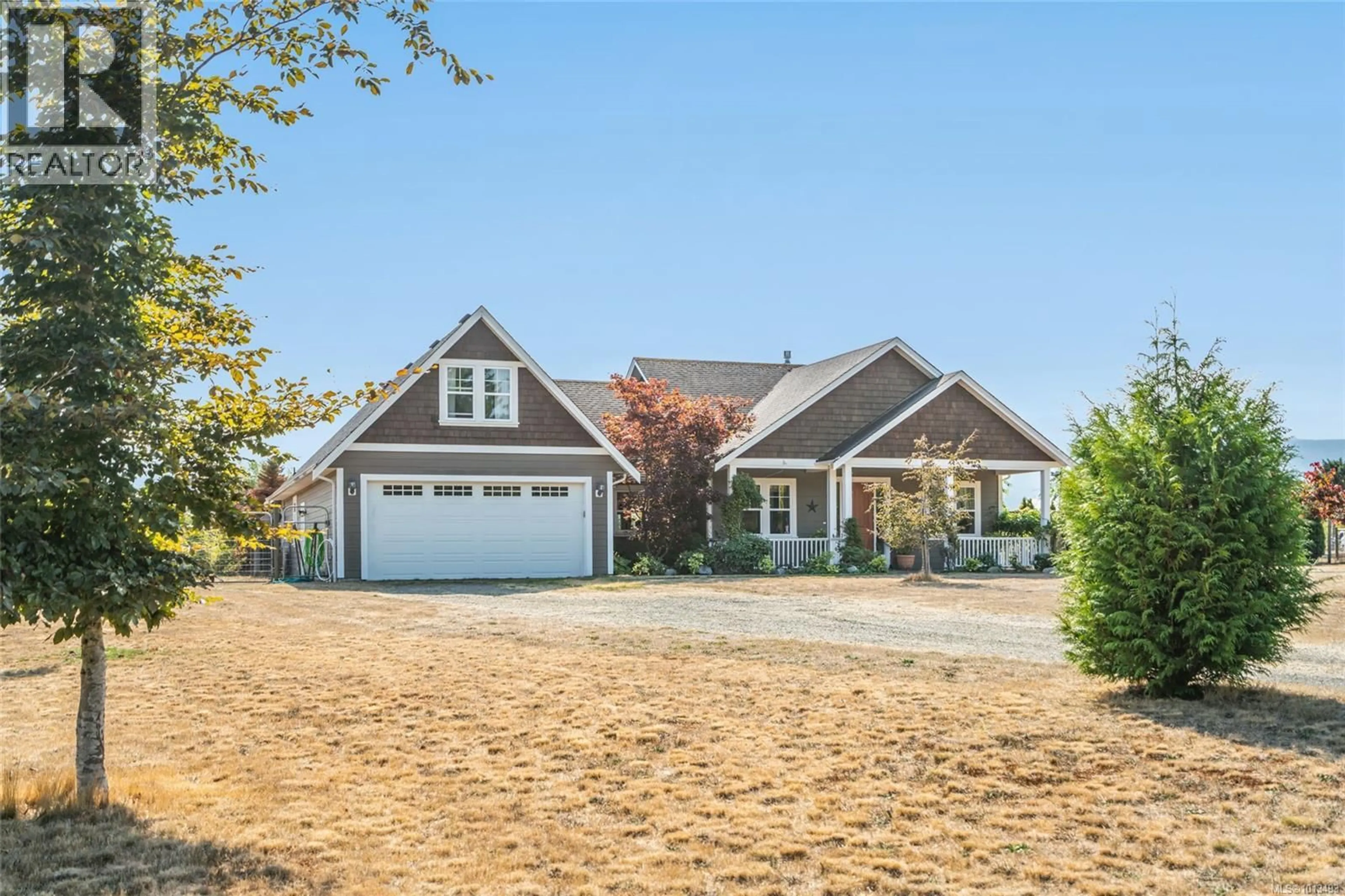 Home with vinyl exterior material, street for 2050 SUN KING ROAD, Coombs British Columbia V0R1M0