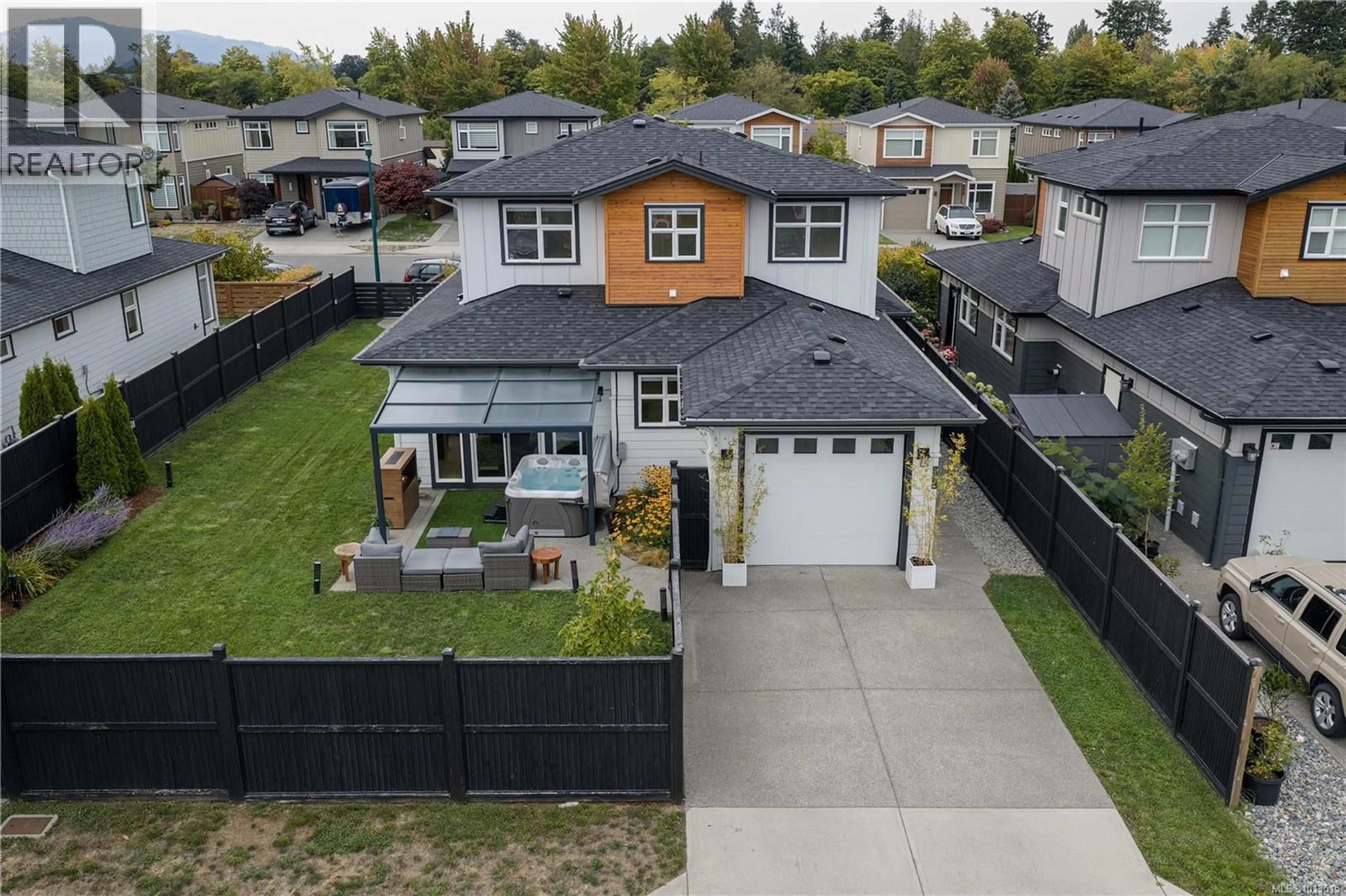 A pic from outside/outdoor area/front of a property/back of a property/a pic from drone, street for 2083 DEERBRUSH CRESCENT, North Saanich British Columbia V8L1P1