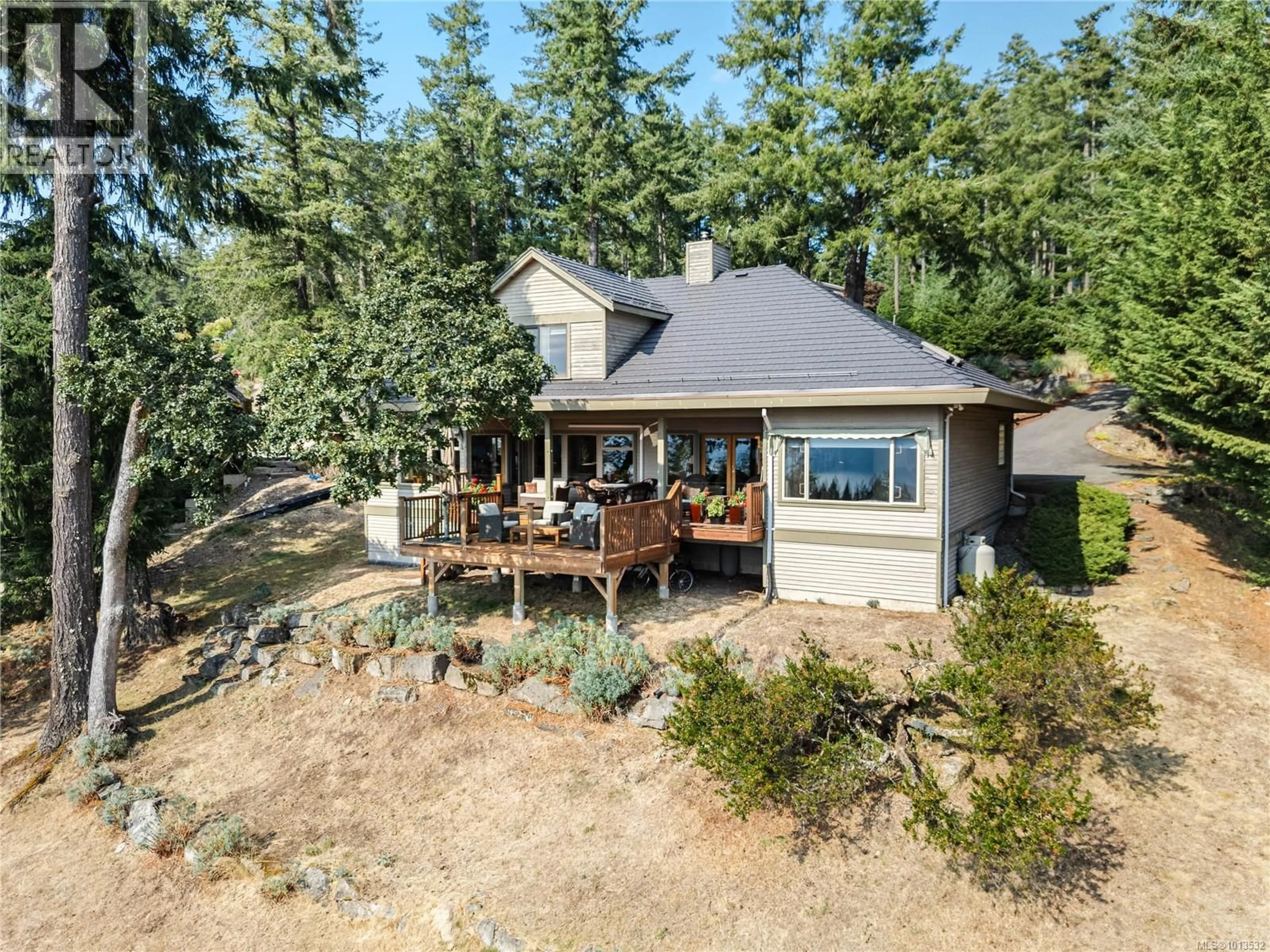 A pic from outside/outdoor area/front of a property/back of a property/a pic from drone, water/lake/river/ocean view for 235 CANVASBACK PLACE, Salt Spring British Columbia V8K2W5