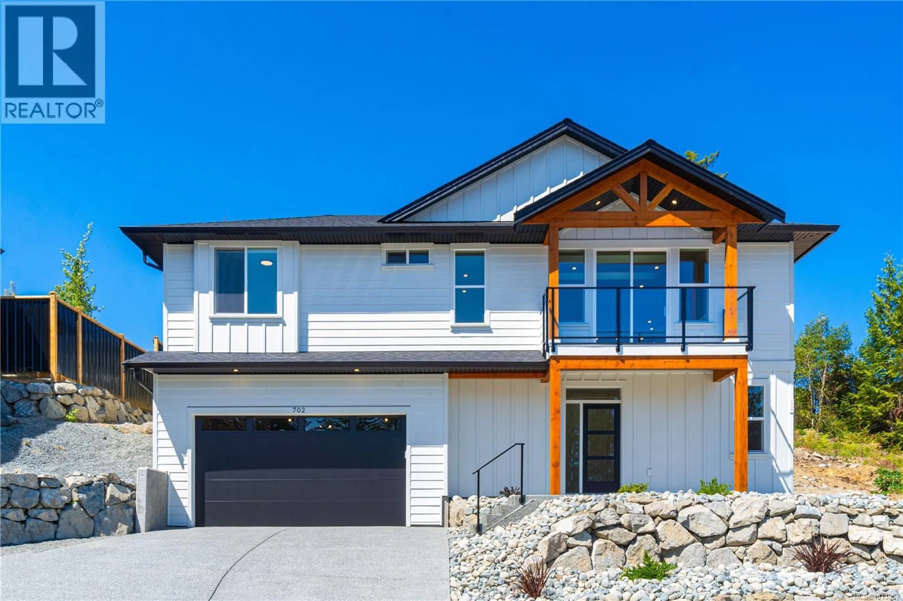 Home with vinyl exterior material, street for 702 STRINGER WAY, Ladysmith British Columbia V9G0A7