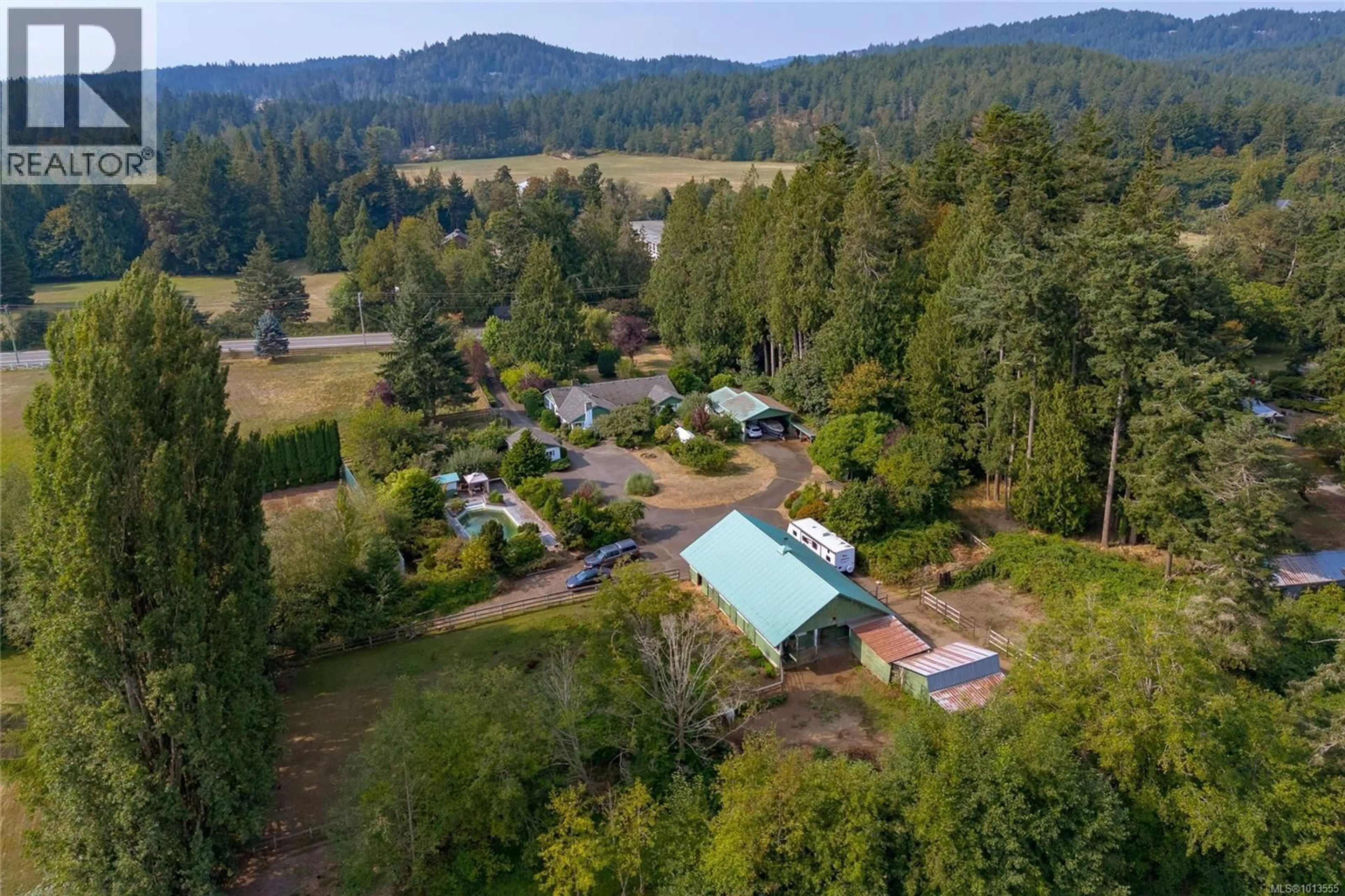 A pic from outside/outdoor area/front of a property/back of a property/a pic from drone, mountain view for 4353 HAPPY VALLEY ROAD, Metchosin British Columbia V9C3Y3