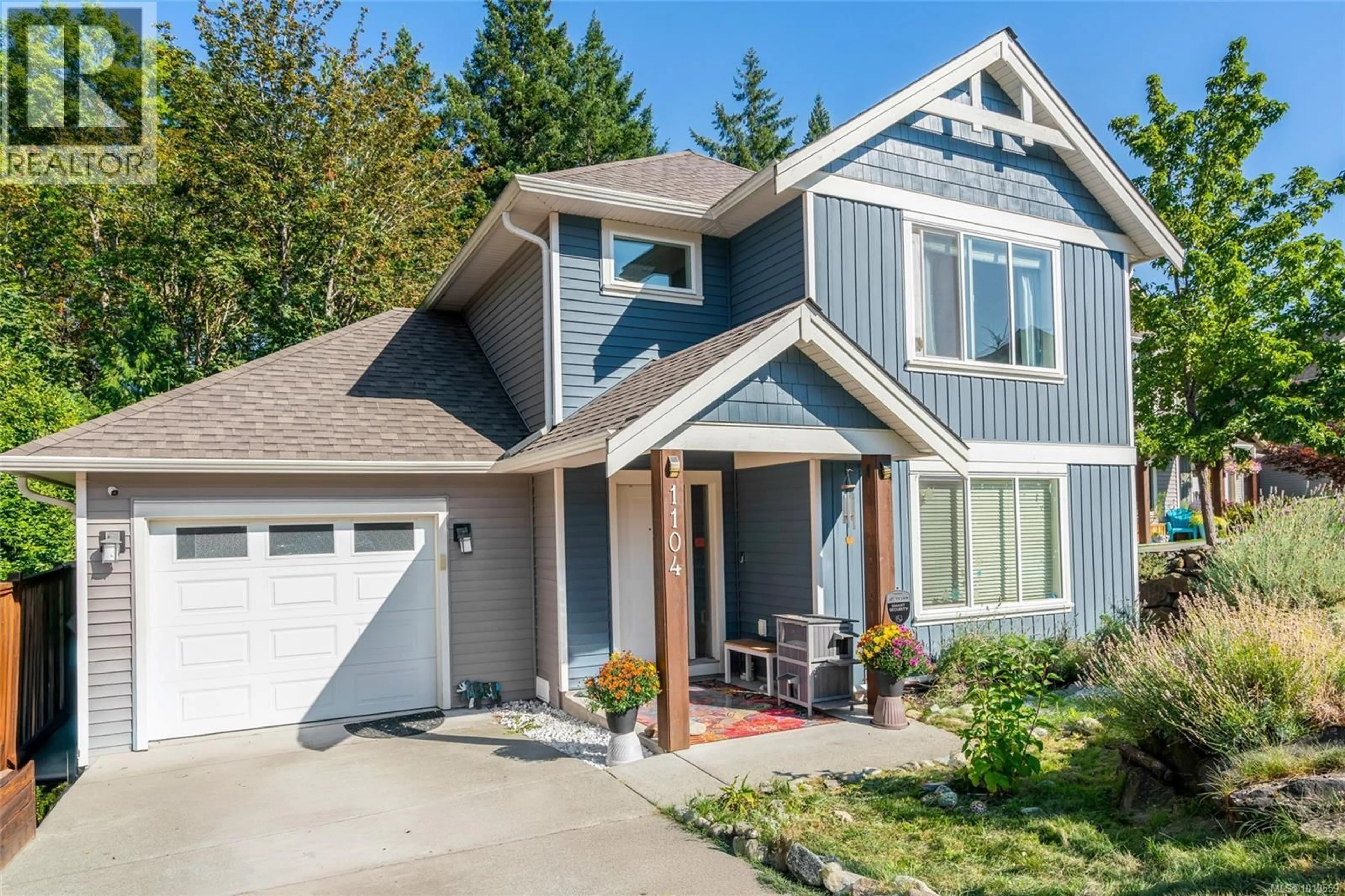 Home with vinyl exterior material, street for 1104 TIMBERWOOD DRIVE, Nanaimo British Columbia V9R0H2