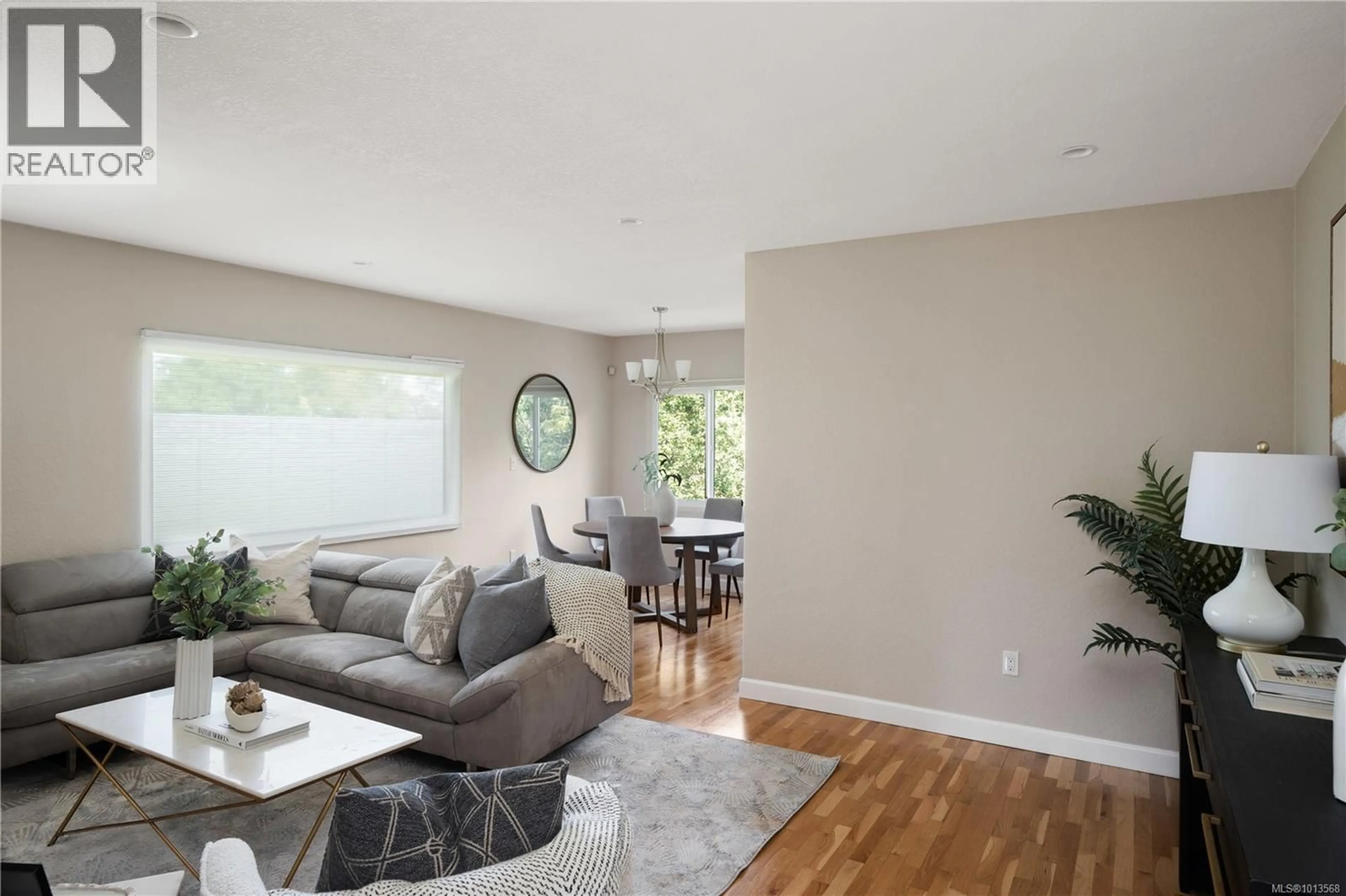 Living room with furniture, wood/laminate floor for 1697 YALE STREET, Oak Bay British Columbia V8R5N5