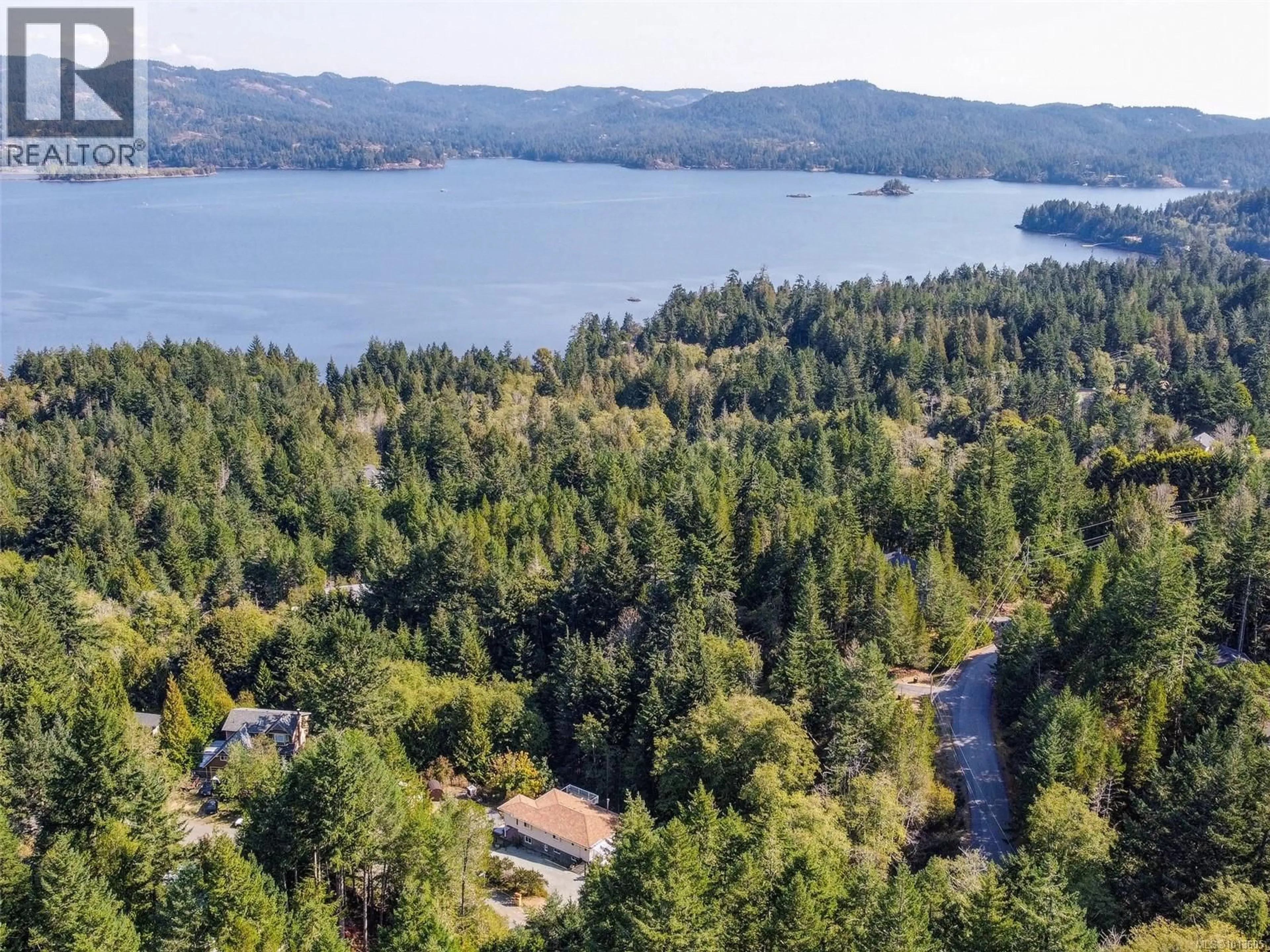 A pic from outside/outdoor area/front of a property/back of a property/a pic from drone, water/lake/river/ocean view for 1480 WINSLOW DRIVE, Sooke British Columbia V9Z1B2