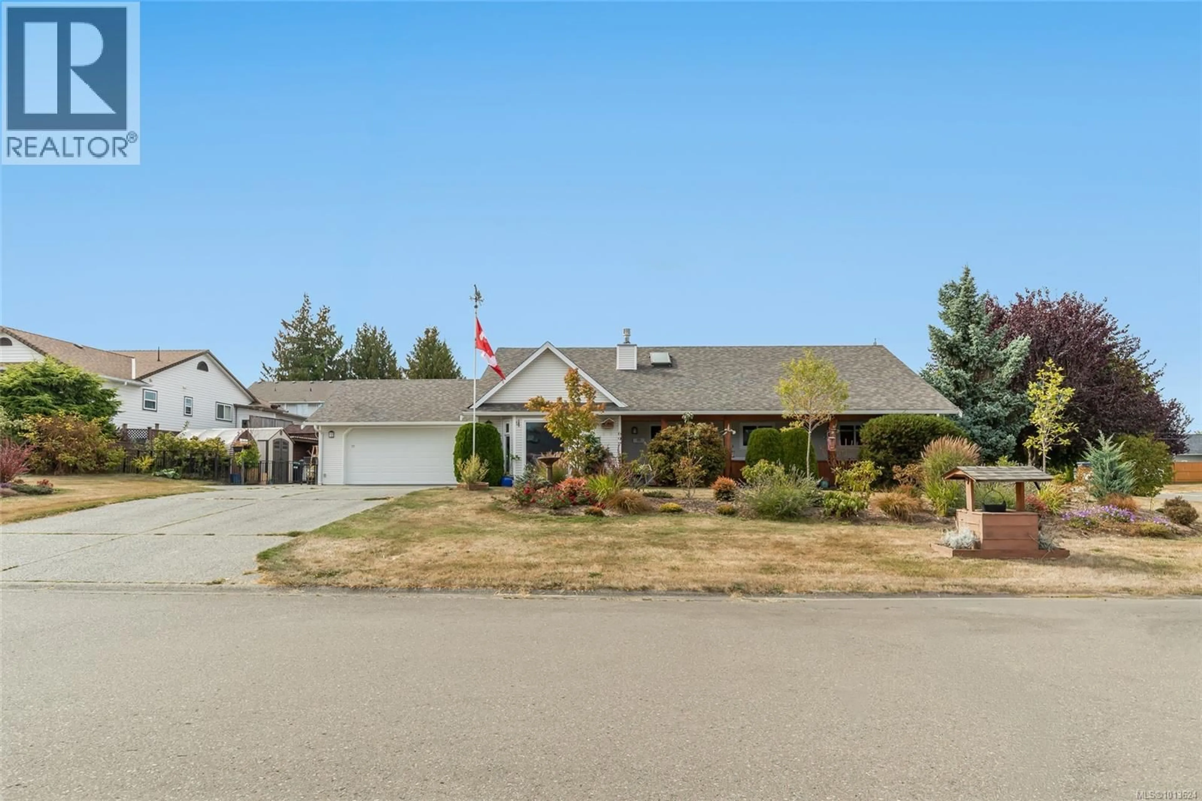 Home with vinyl exterior material, street for 697 WOODBURN STREET, Parksville British Columbia V9P2M1