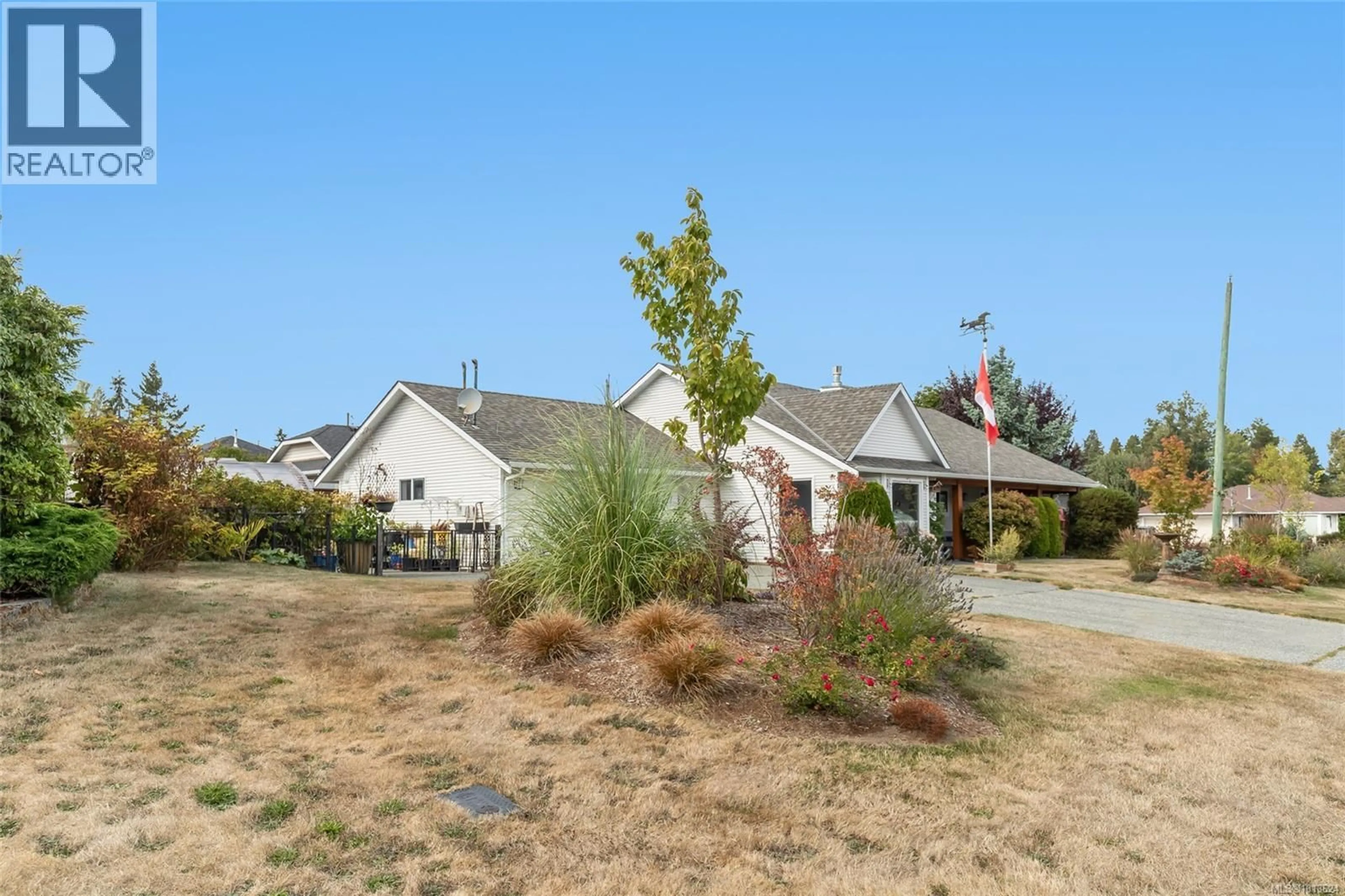 A pic from outside/outdoor area/front of a property/back of a property/a pic from drone, unknown for 697 WOODBURN STREET, Parksville British Columbia V9P2M1