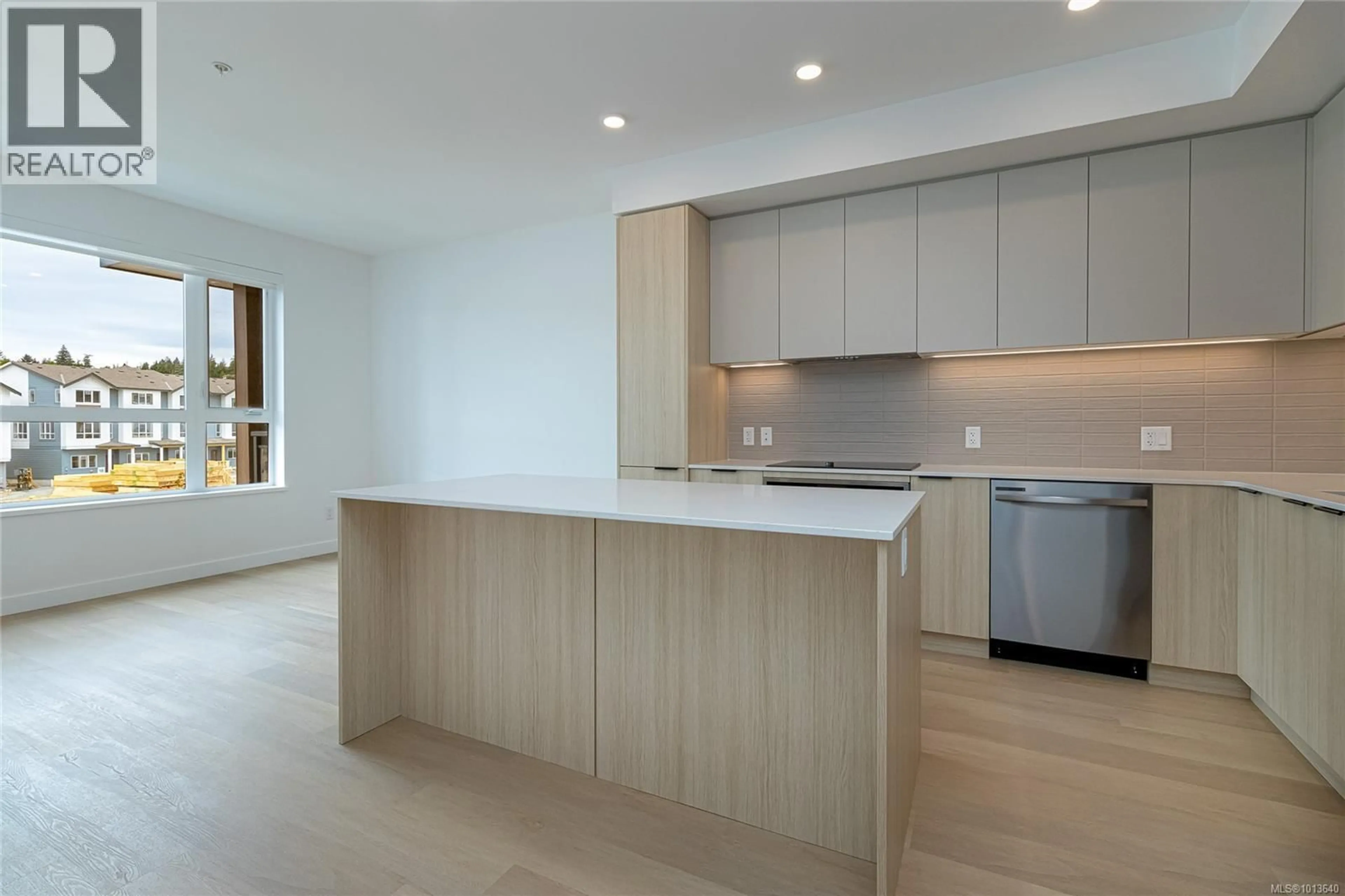 Open concept kitchen, unknown for 310 - 3564B RYDER HESJEDAL WAY, Colwood British Columbia V9C0V3