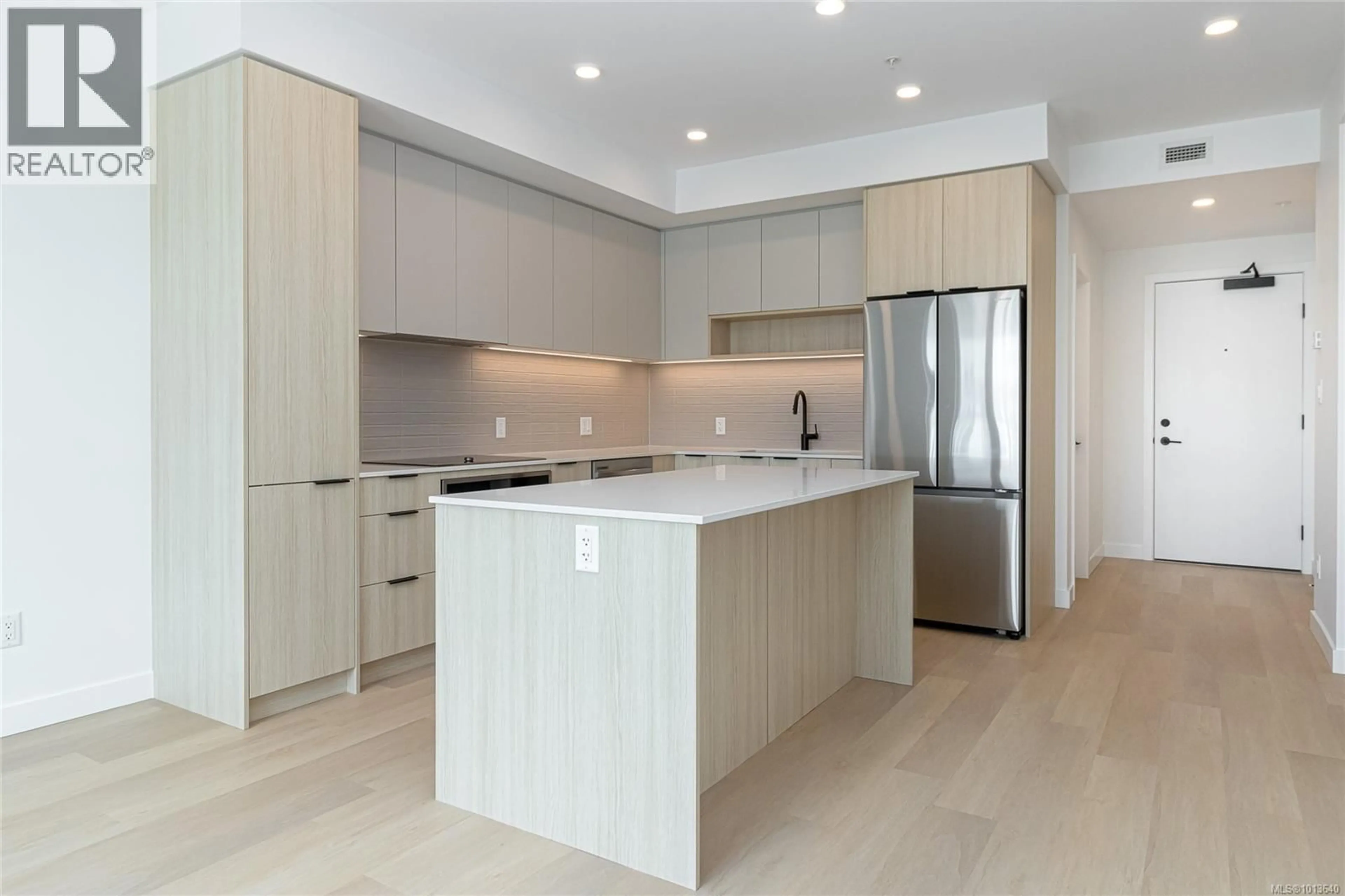 Open concept kitchen, unknown for 310 - 3564B RYDER HESJEDAL WAY, Colwood British Columbia V9C0V3