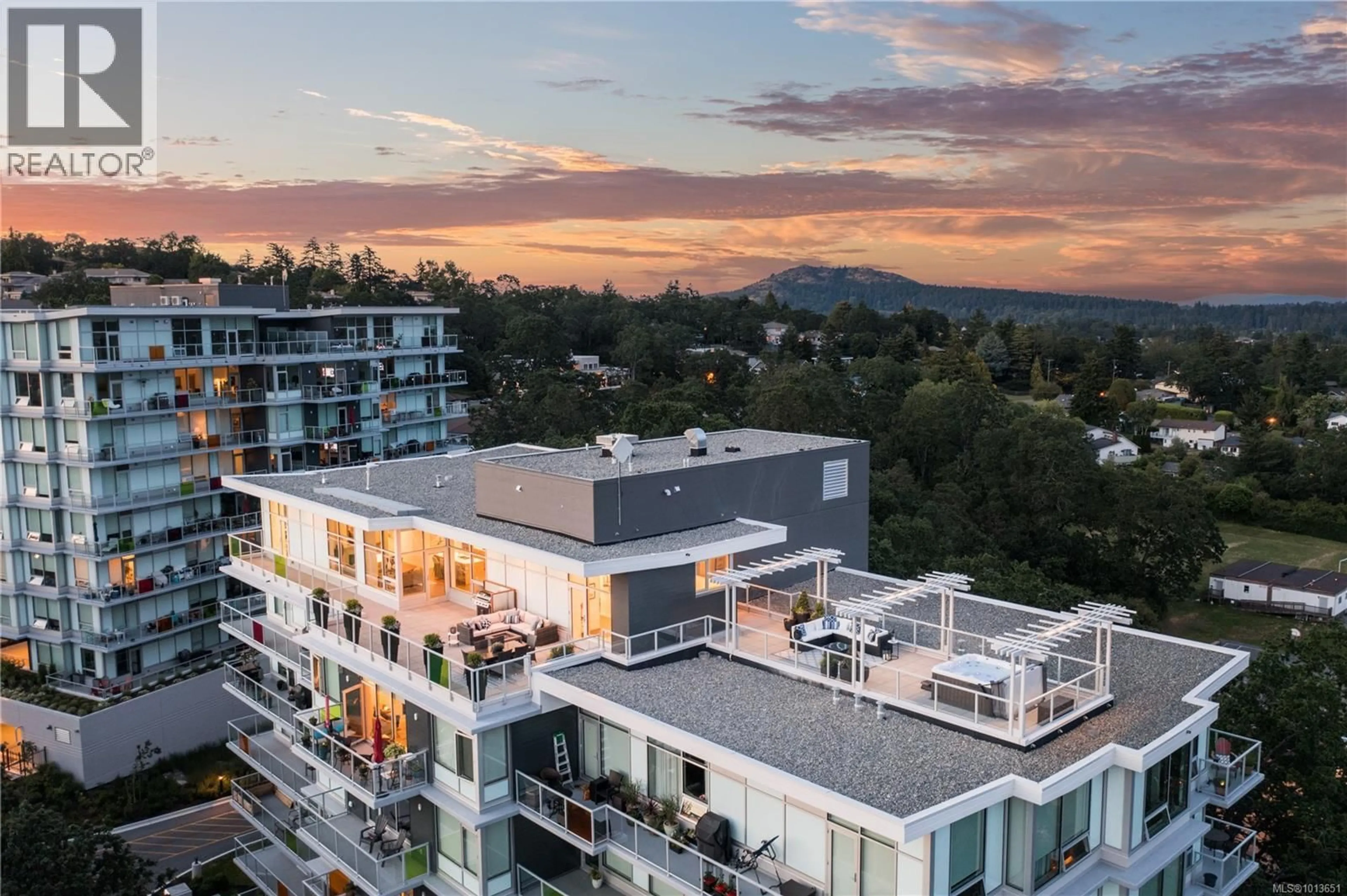 A pic from outside/outdoor area/front of a property/back of a property/a pic from drone, mountain view for PH902 - 4009 RAINBOW HILL LANE, Saanich British Columbia V8X0B3