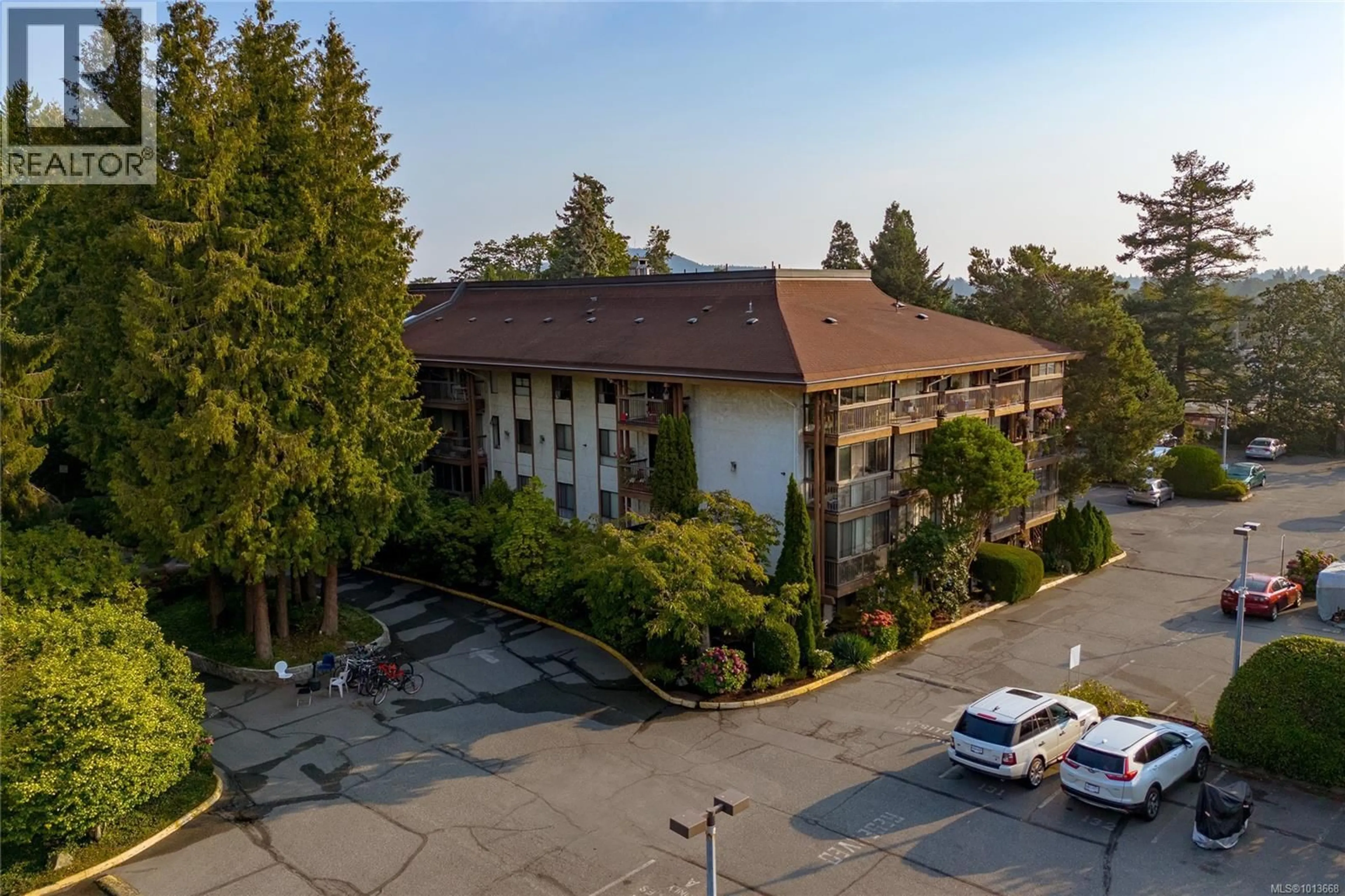 A pic from outside/outdoor area/front of a property/back of a property/a pic from drone, mountain view for 407 - 1009 MCKENZIE AVENUE, Saanich British Columbia V8X4B1