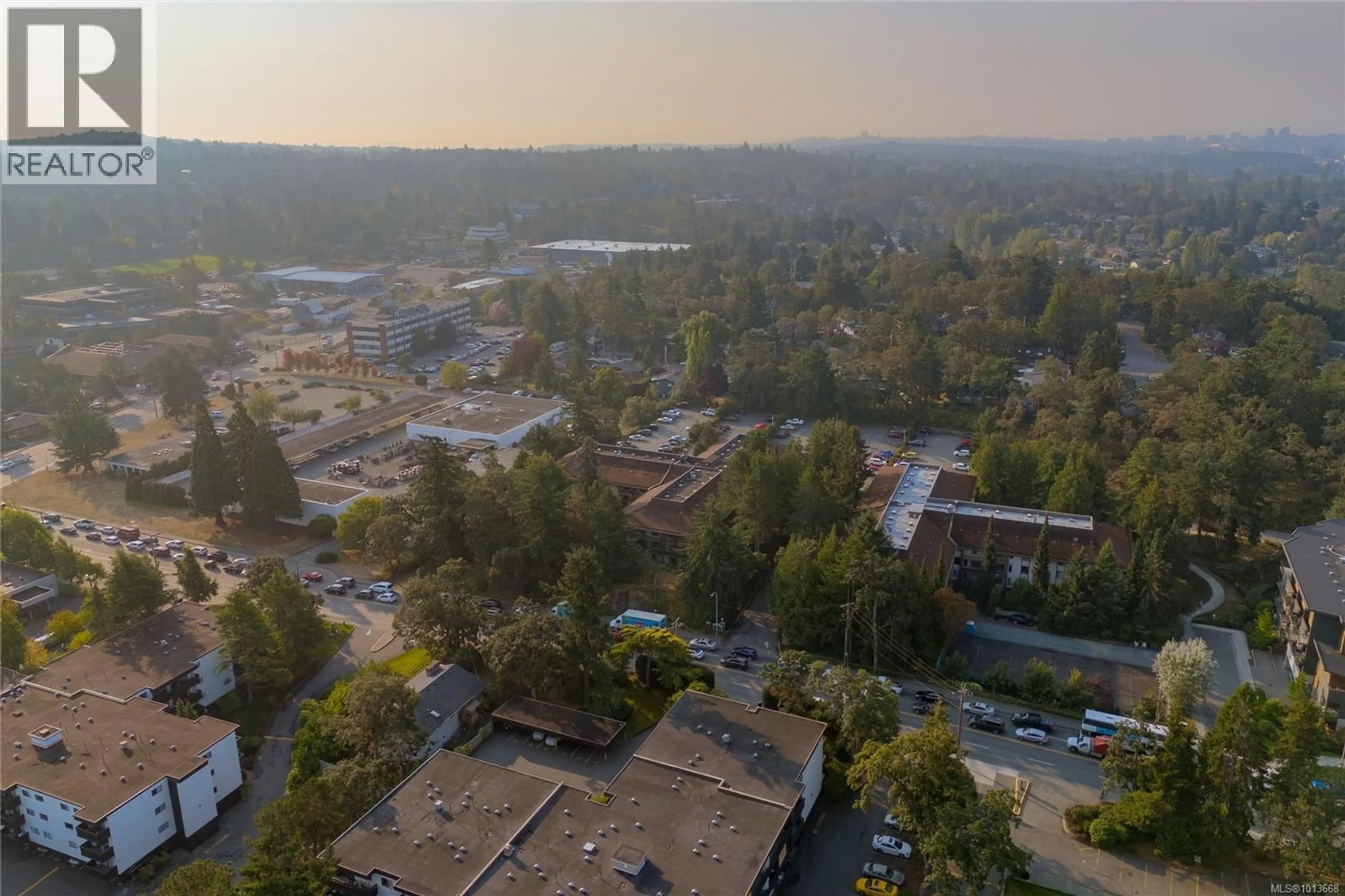 A pic from outside/outdoor area/front of a property/back of a property/a pic from drone, unknown for 407 - 1009 MCKENZIE AVENUE, Saanich British Columbia V8X4B1