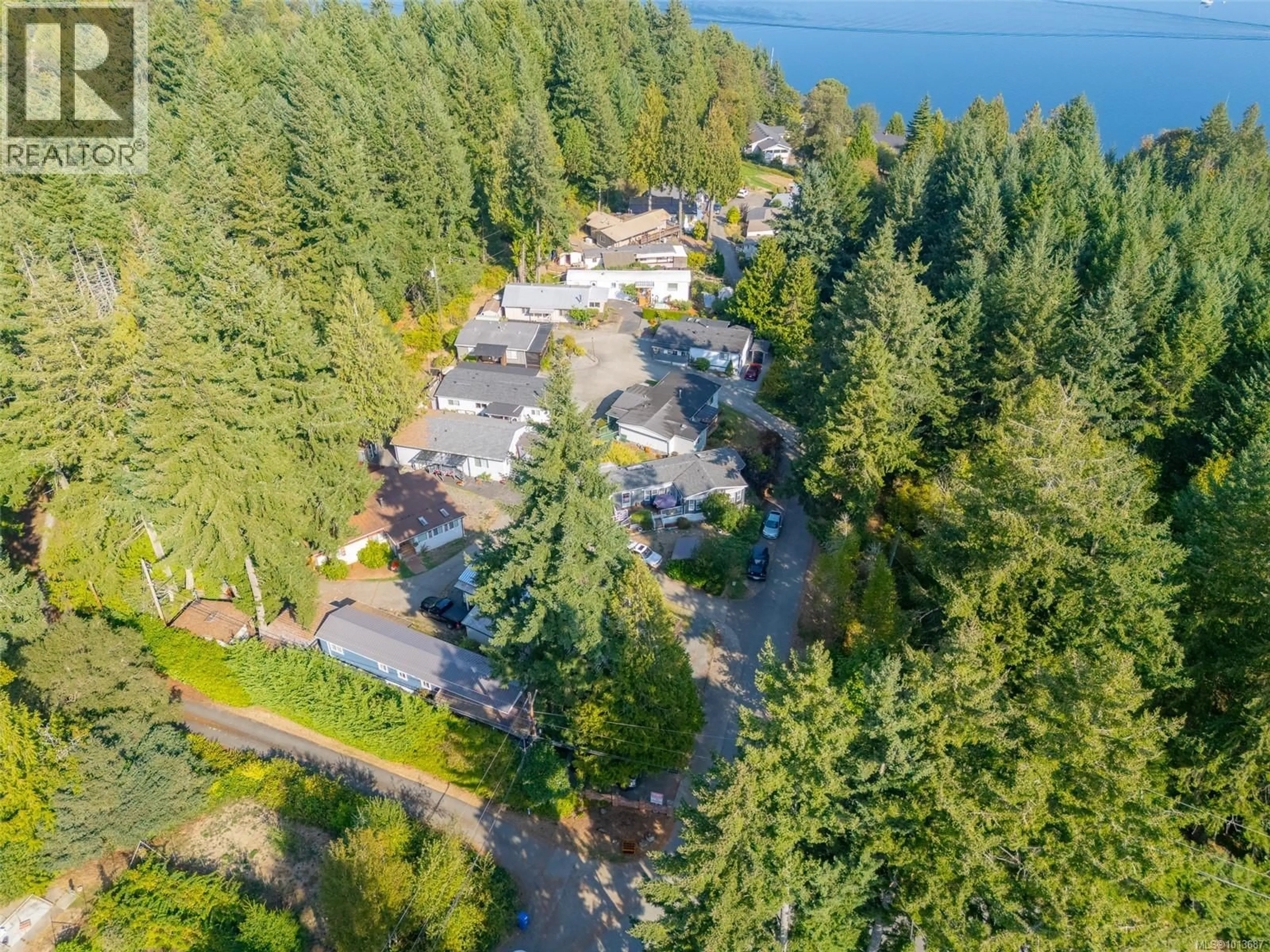 A pic from outside/outdoor area/front of a property/back of a property/a pic from drone, water/lake/river/ocean view for 3 - 4544 LANES ROAD, Cowichan Bay British Columbia V0R1N2