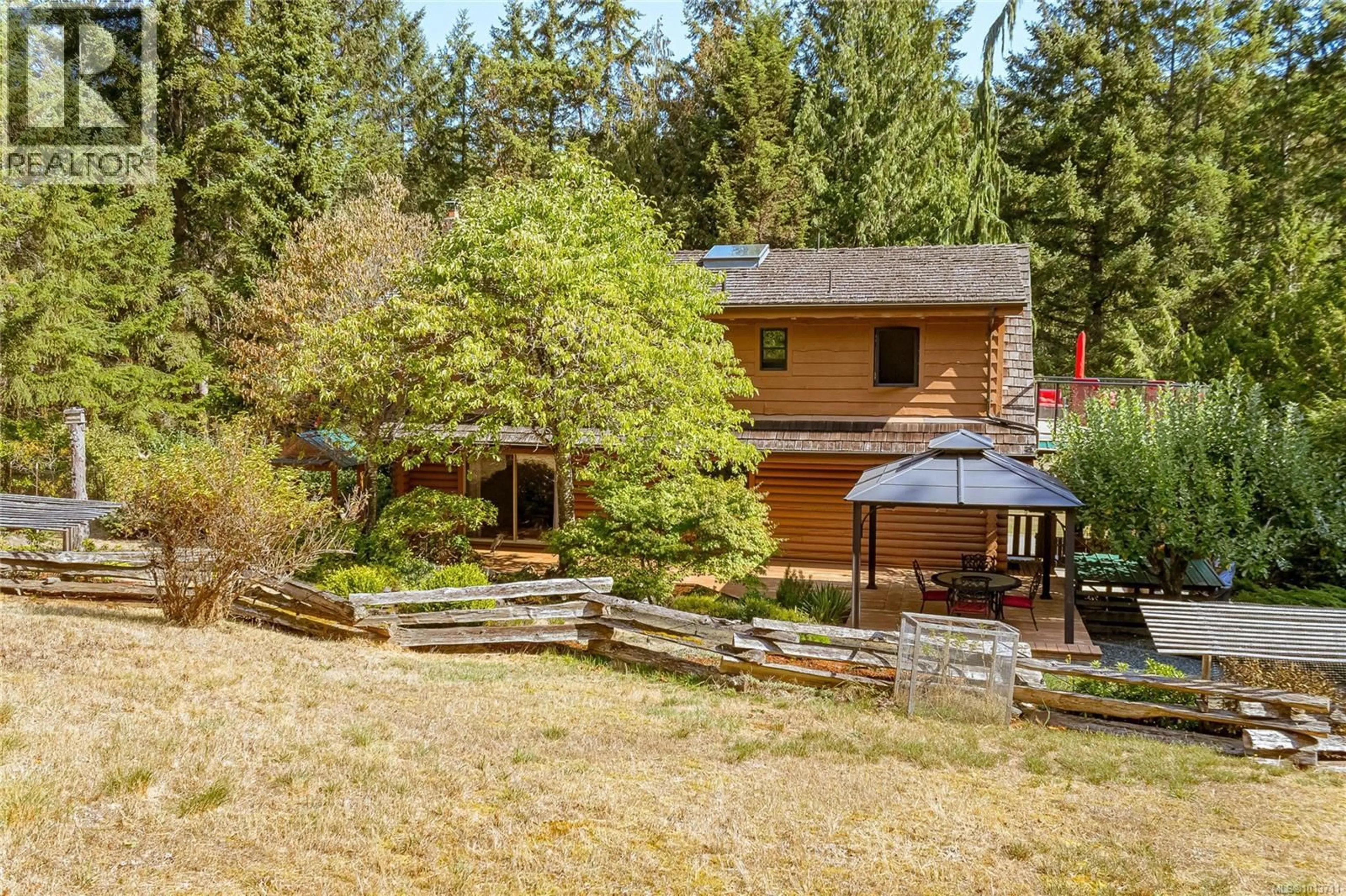 A pic from outside/outdoor area/front of a property/back of a property/a pic from drone, forest/trees view for 673 WESTERN ACRES ROAD, Nanaimo British Columbia V9K5W9