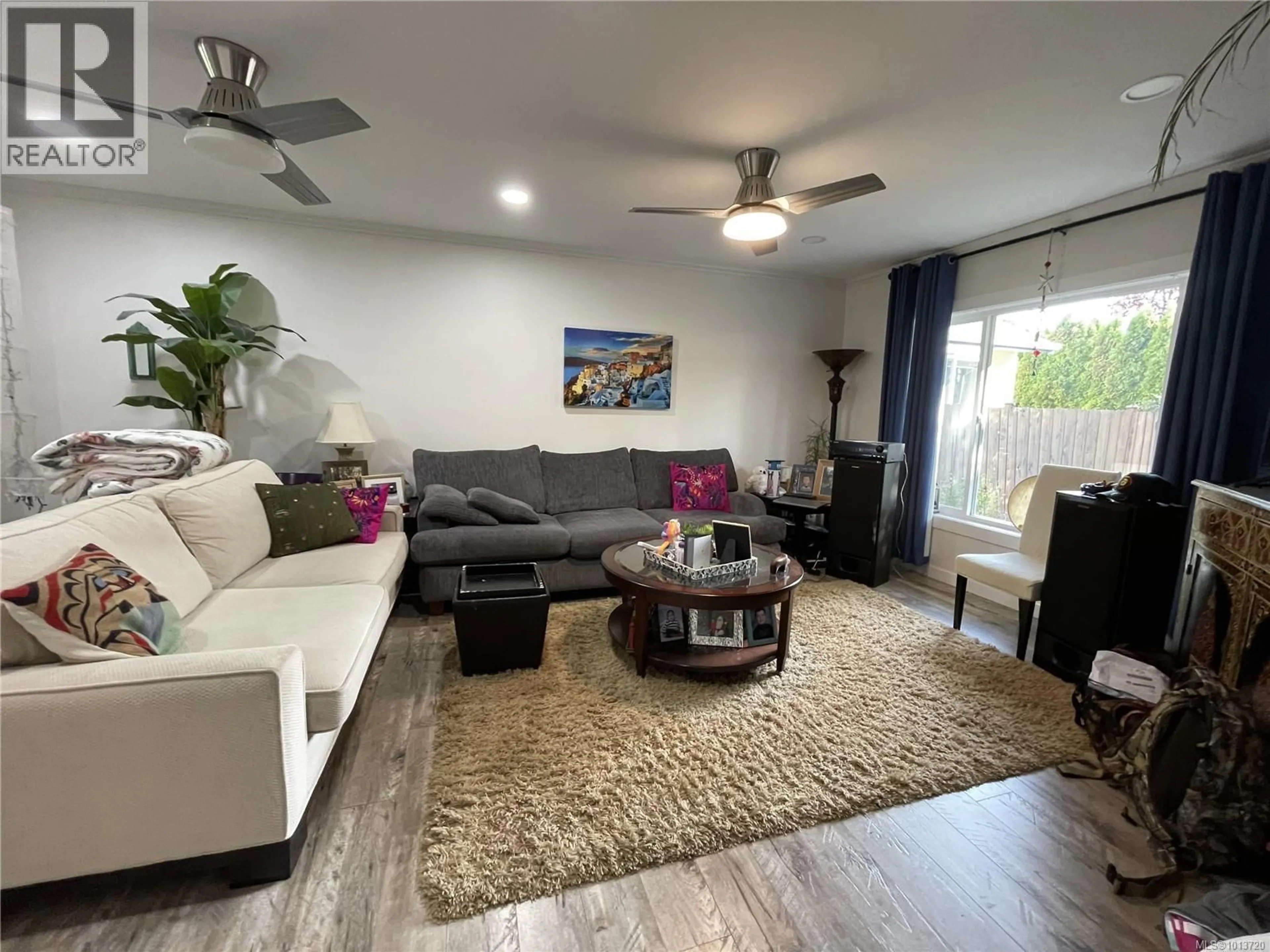 Living room with furniture, wood/laminate floor for 3650 8TH AVENUE, Port Alberni British Columbia V9Y4R5