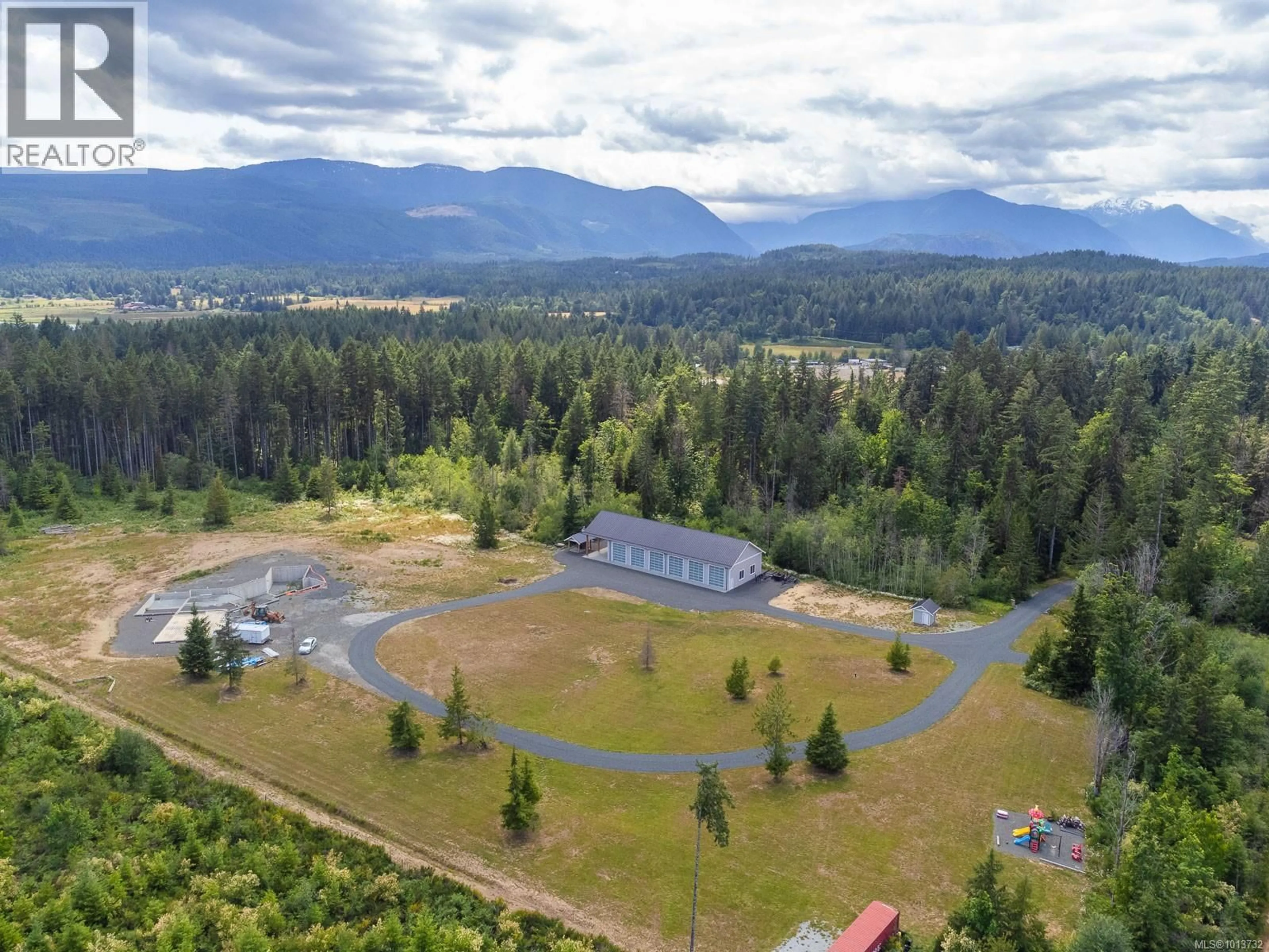 A pic from outside/outdoor area/front of a property/back of a property/a pic from drone, mountain view for 7444 BELL ROAD, Port Alberni British Columbia V9Y9E7