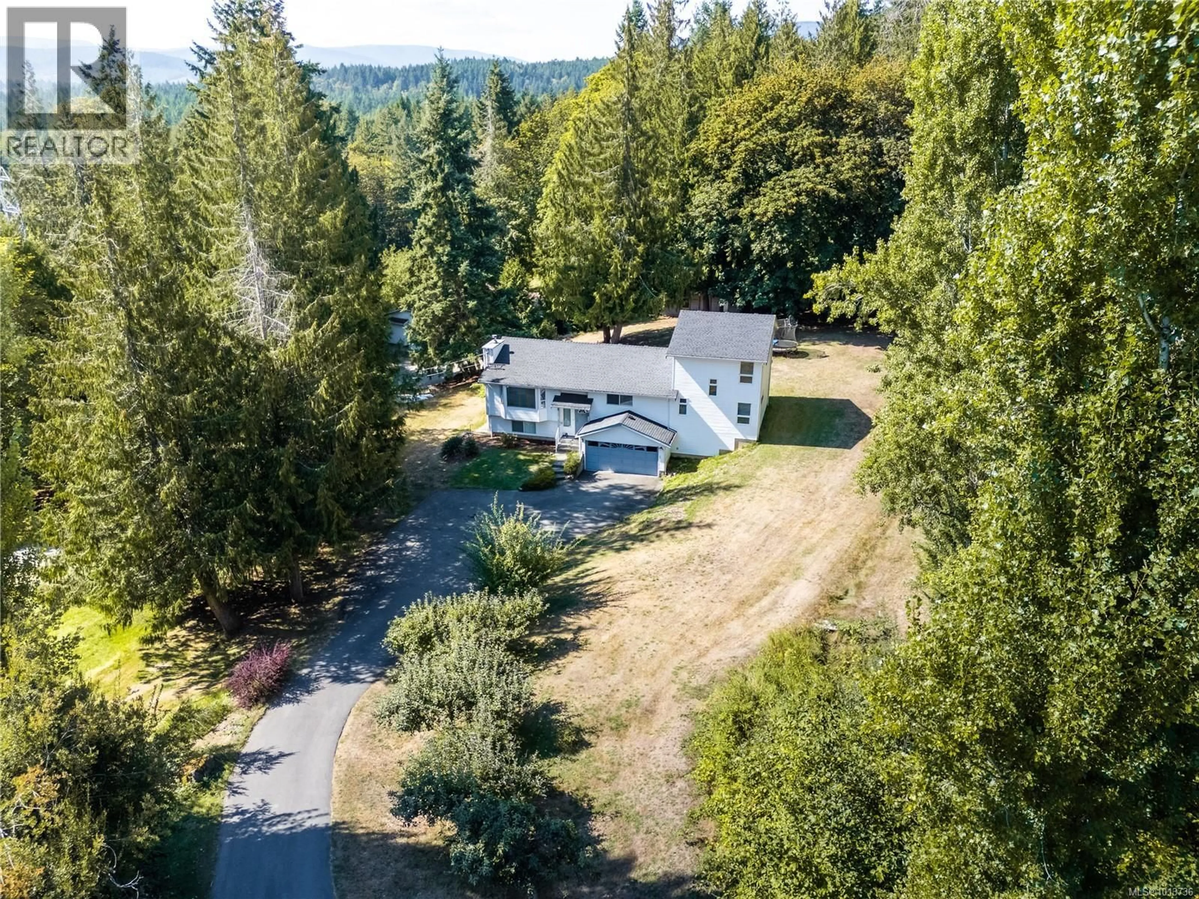 A pic from outside/outdoor area/front of a property/back of a property/a pic from drone, forest/trees view for 3300 TYERMAN PLACE, Cobble Hill British Columbia V8H0B3