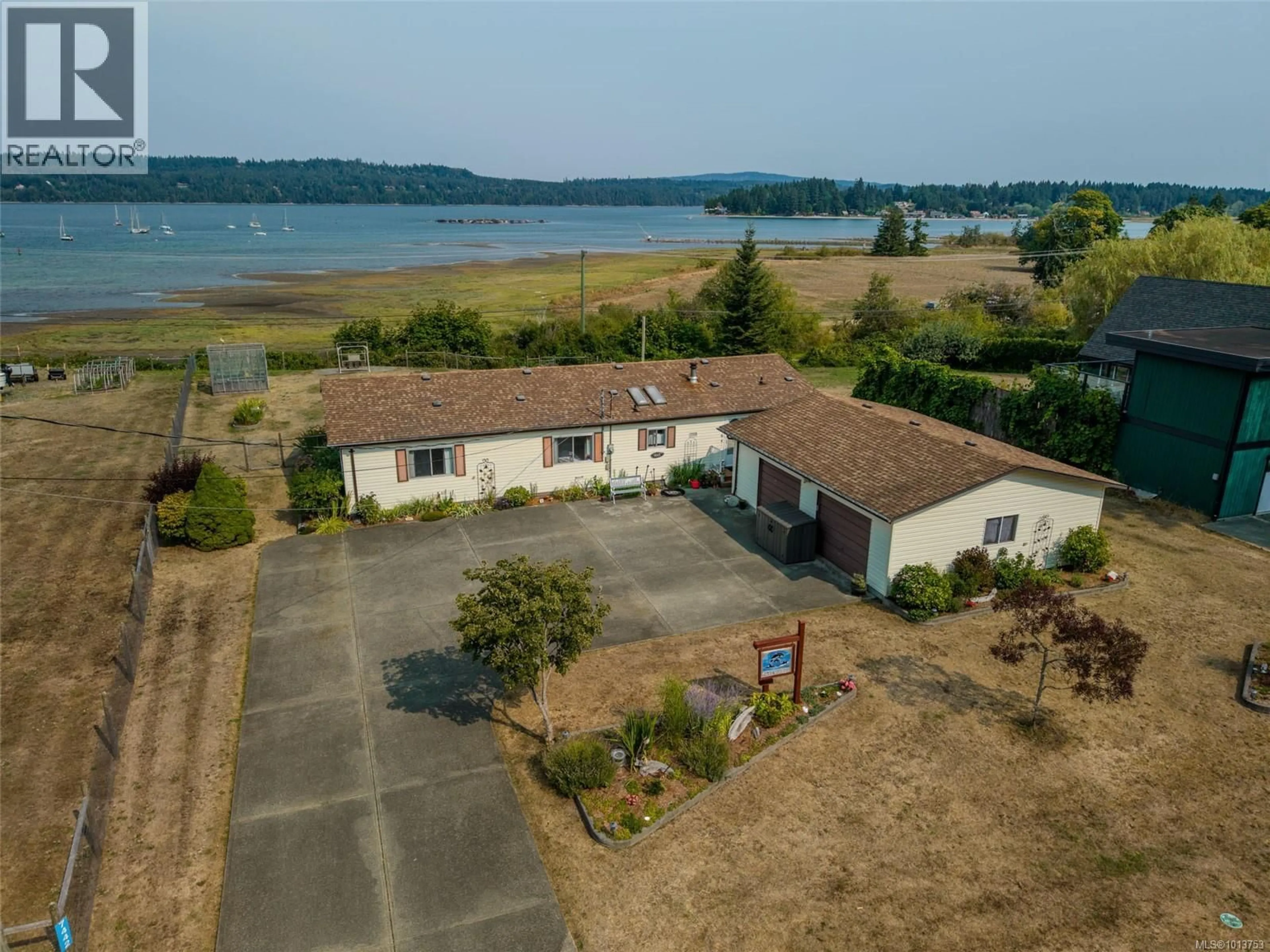 A pic from outside/outdoor area/front of a property/back of a property/a pic from drone, water/lake/river/ocean view for 7442 YAKE ROAD, Fanny Bay British Columbia V0R1W0
