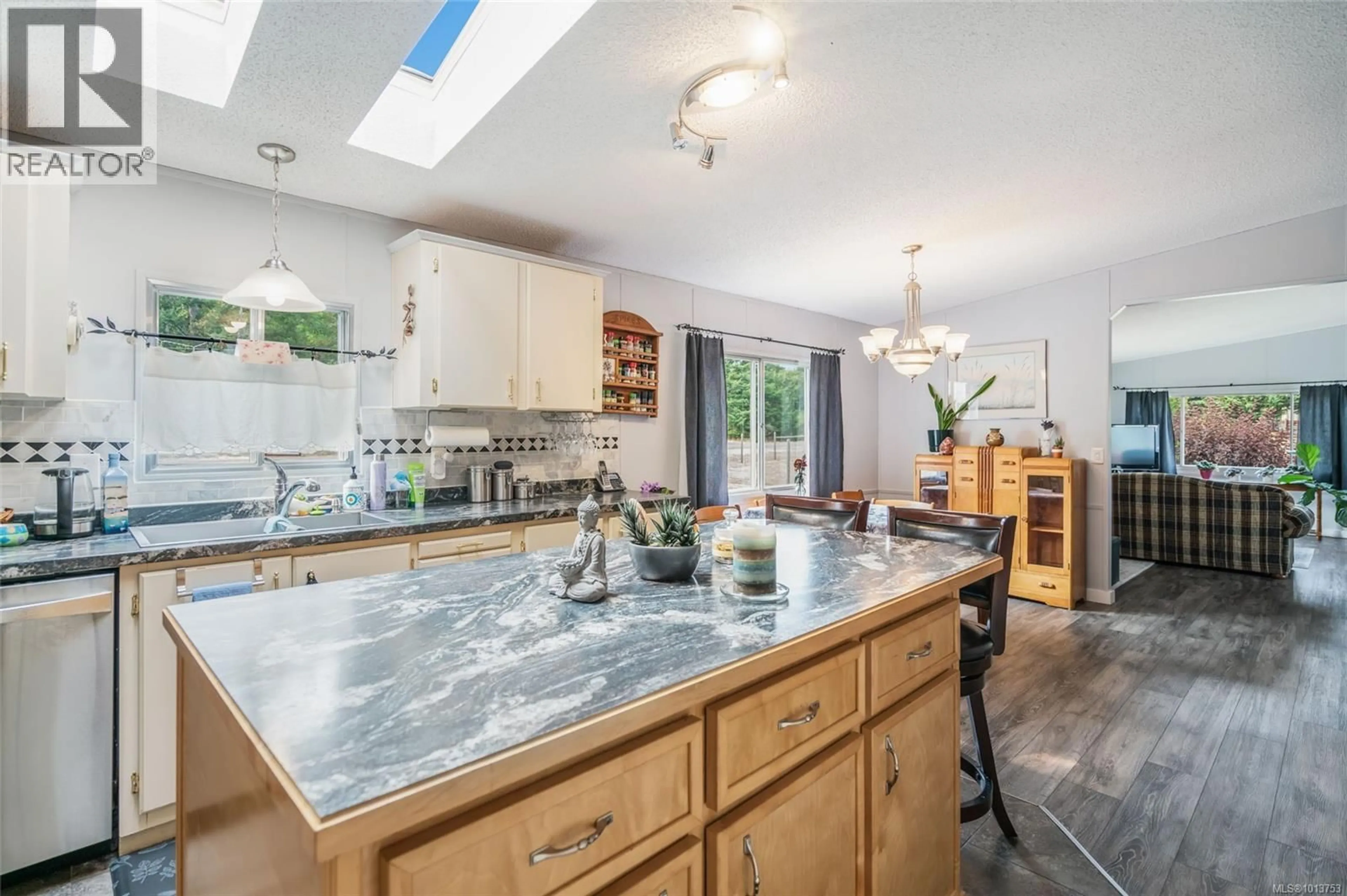 Open concept kitchen, ceramic/tile floor for 7442 YAKE ROAD, Fanny Bay British Columbia V0R1W0