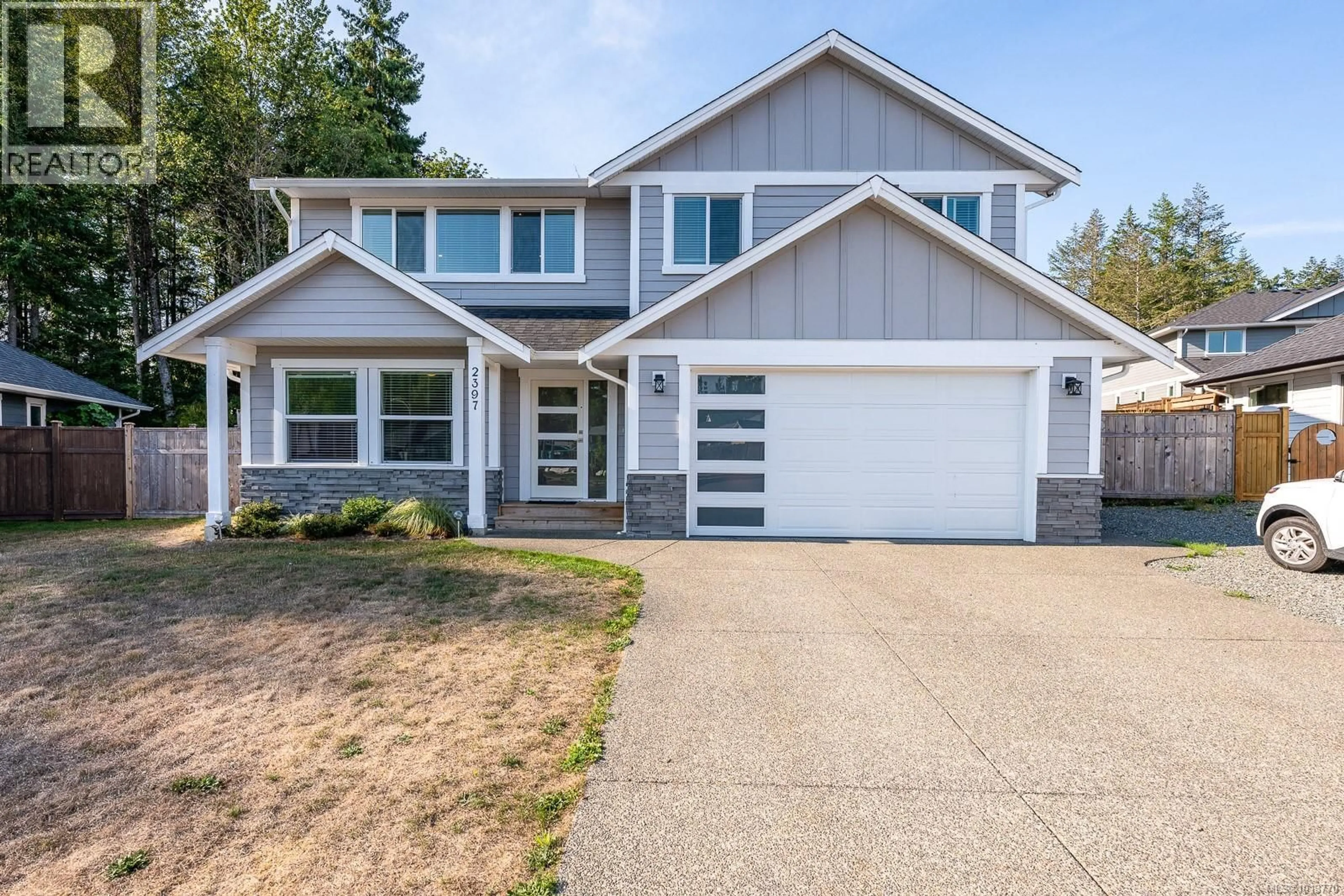 Home with vinyl exterior material, street for 2397 BROOKFIELD DRIVE, Courtenay British Columbia V9N0E6