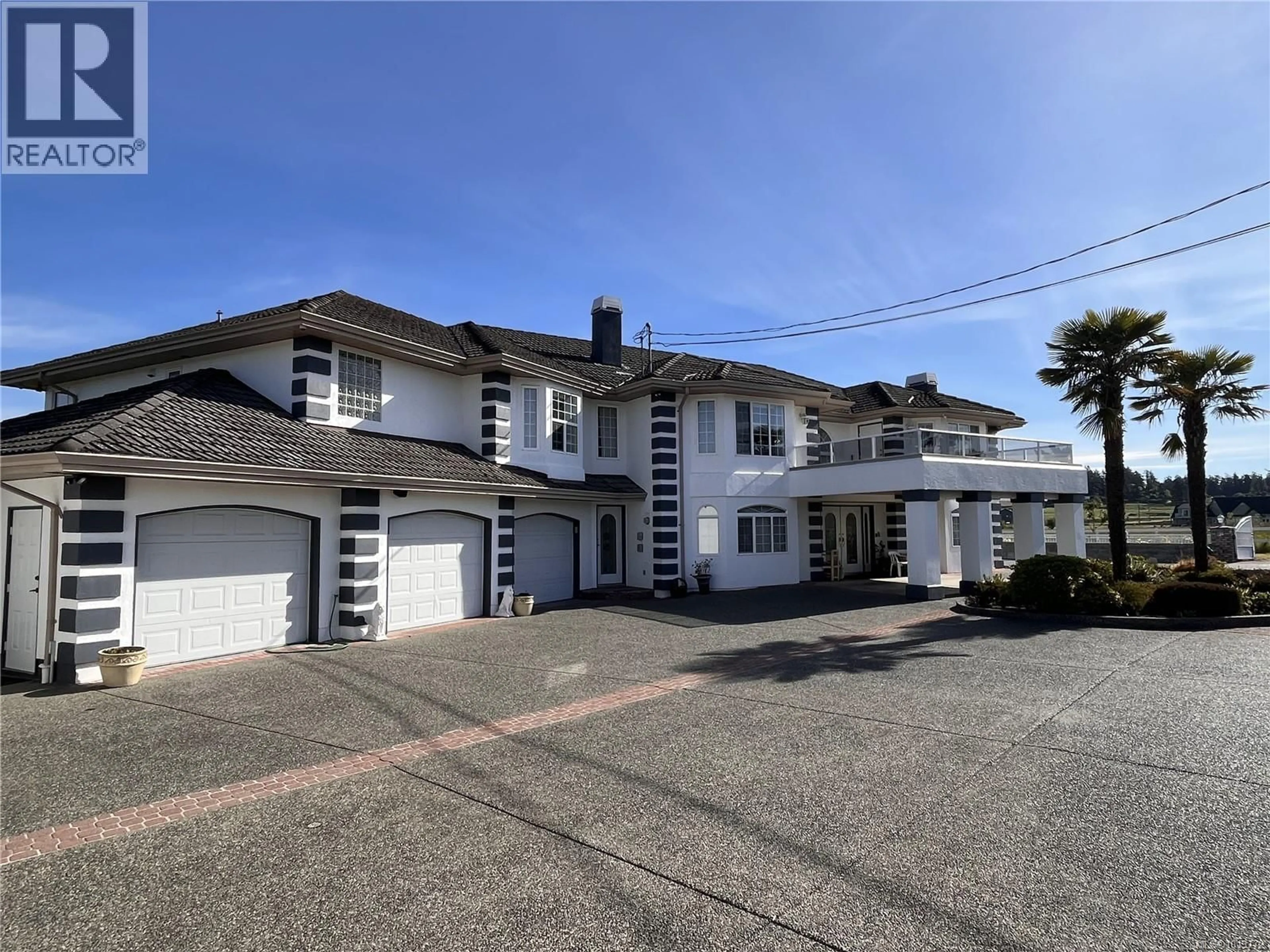 A pic from outside/outdoor area/front of a property/back of a property/a pic from drone, street for 7112 PUCKLE ROAD, Central Saanich British Columbia V8M1W4