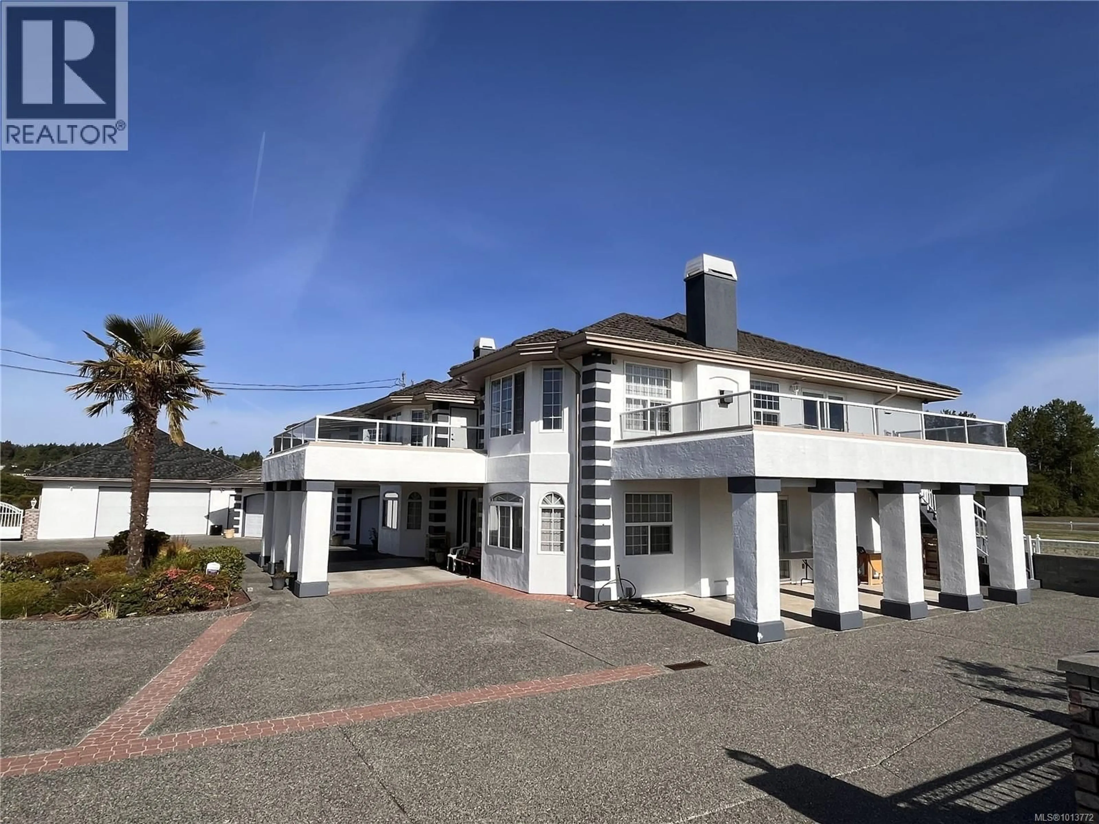 A pic from outside/outdoor area/front of a property/back of a property/a pic from drone, building for 7112 PUCKLE ROAD, Central Saanich British Columbia V8M1W4