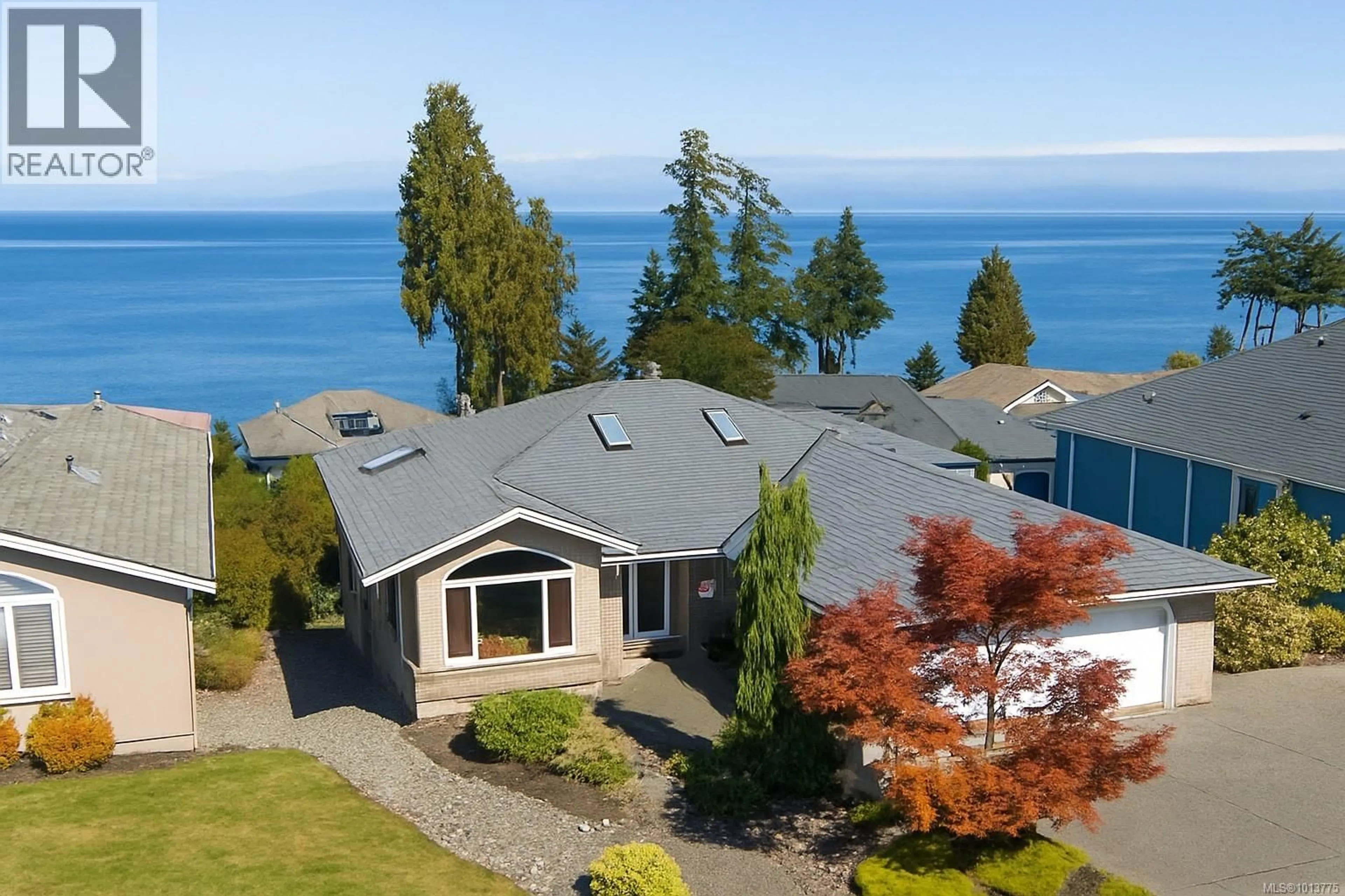A pic from outside/outdoor area/front of a property/back of a property/a pic from drone, water/lake/river/ocean view for 6542 RAVEN ROAD, Nanaimo British Columbia V9V1R1