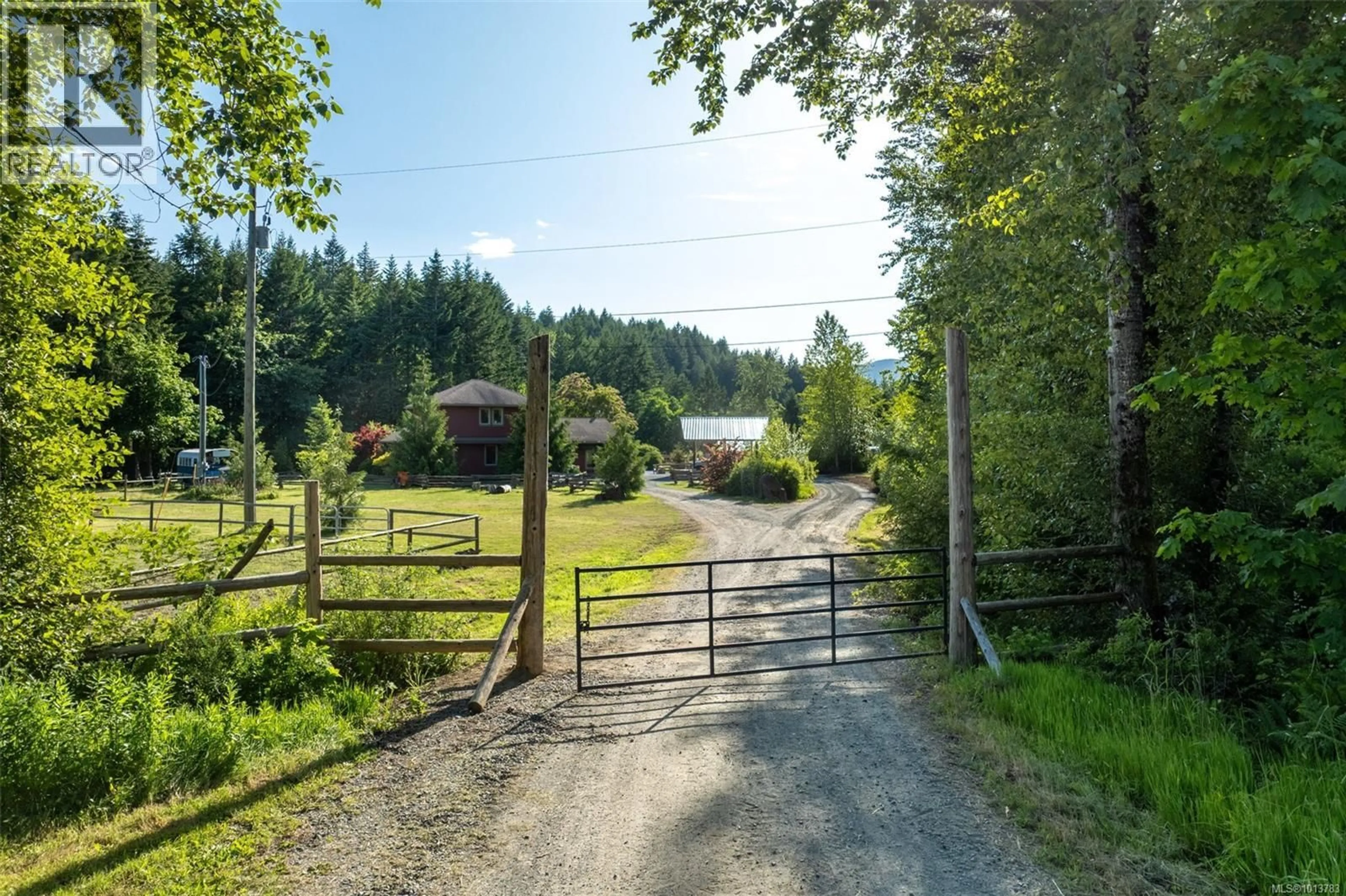 A pic from outside/outdoor area/front of a property/back of a property/a pic from drone, unknown for 3700 HANKINS ROAD, Duncan British Columbia V9L6T2