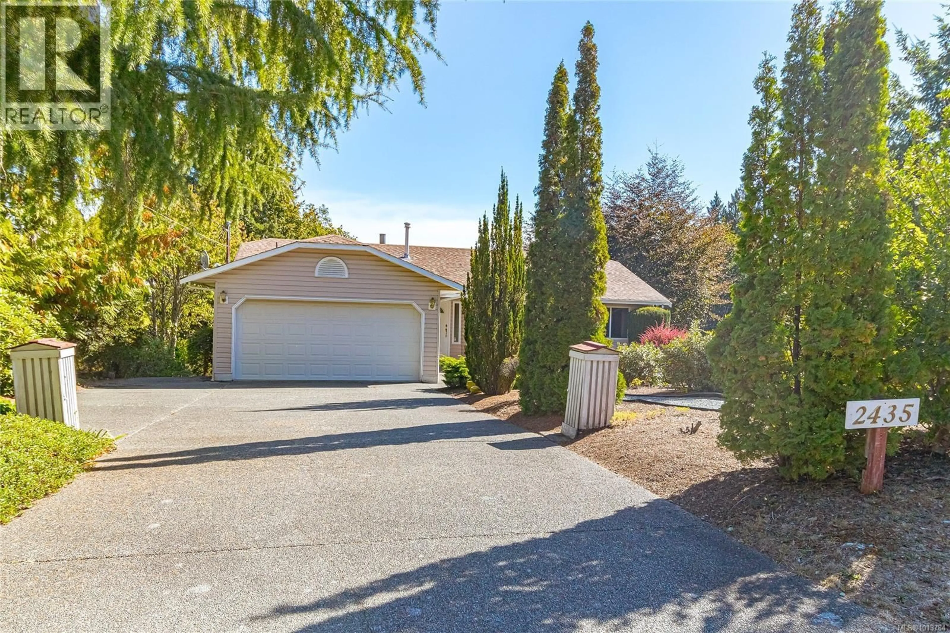 A pic from outside/outdoor area/front of a property/back of a property/a pic from drone, street for 2435 HUCKLEBERRY ROAD, Mill Bay British Columbia V8H1C4
