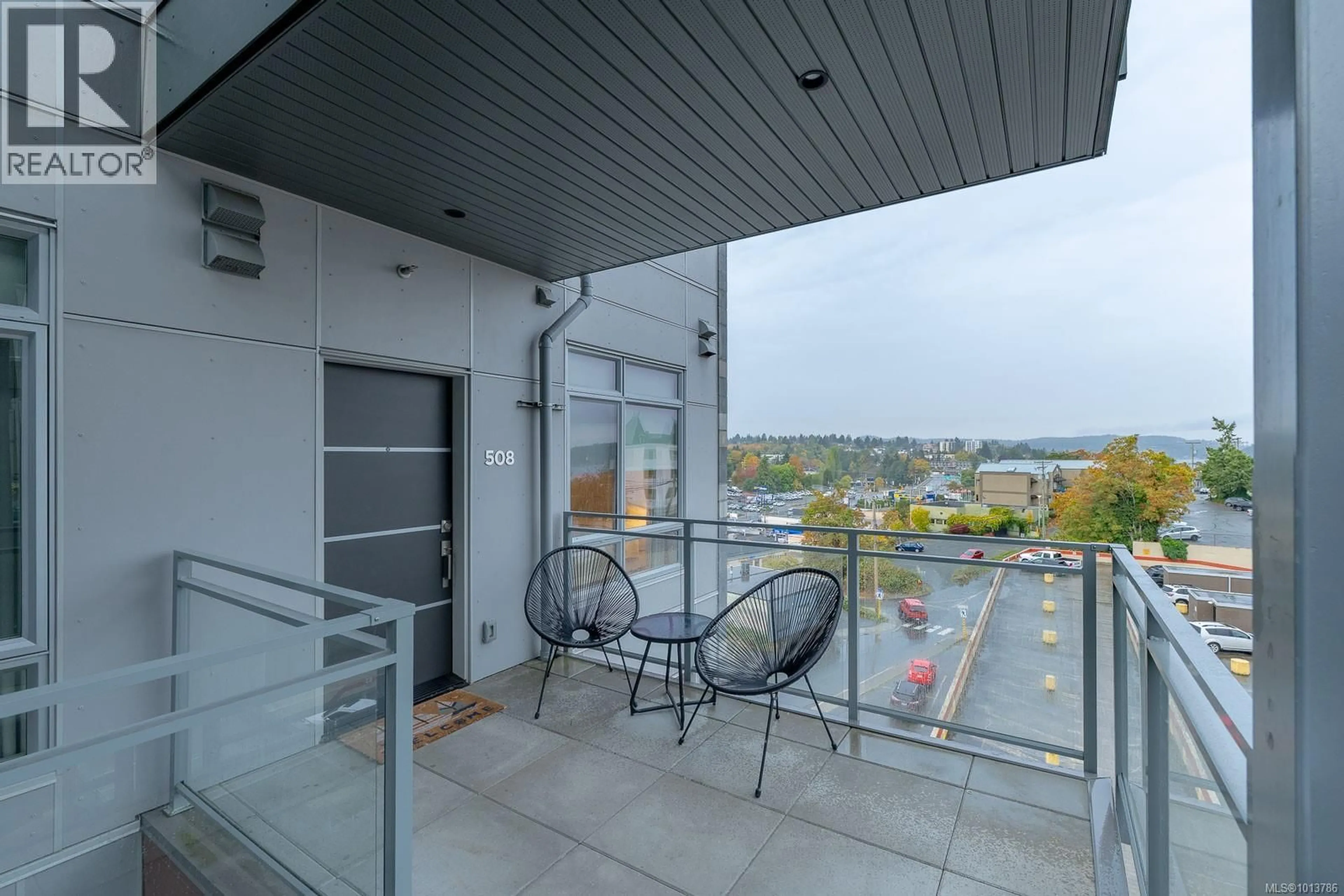Patio, city buildings view from balcony for 508 - 91 CHAPEL STREET, Nanaimo British Columbia V9R0J3